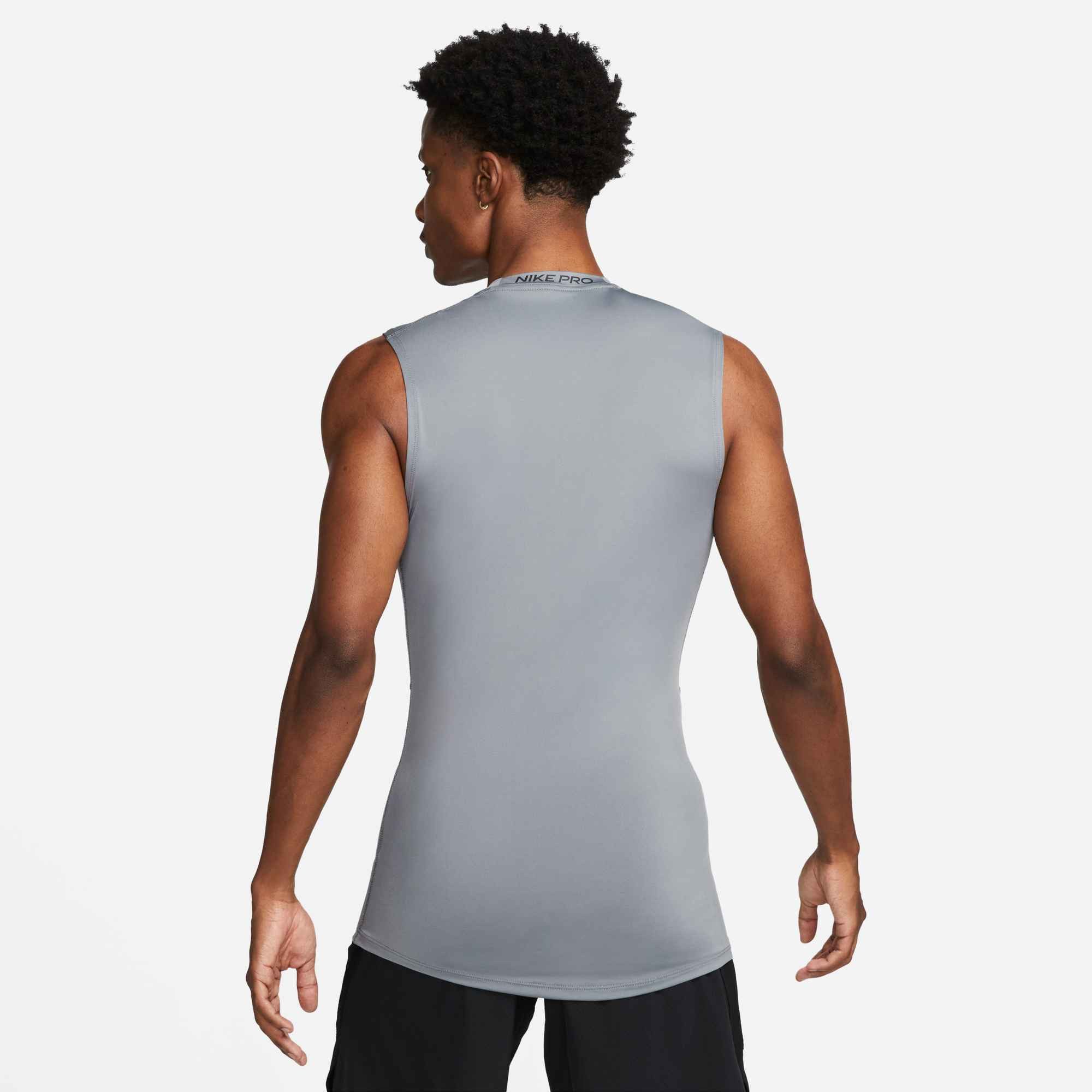 Nike Tanktop M NP DF TOP SL TIGHT schmal geschnitten, ärmelloses Design, mit rundem Saum