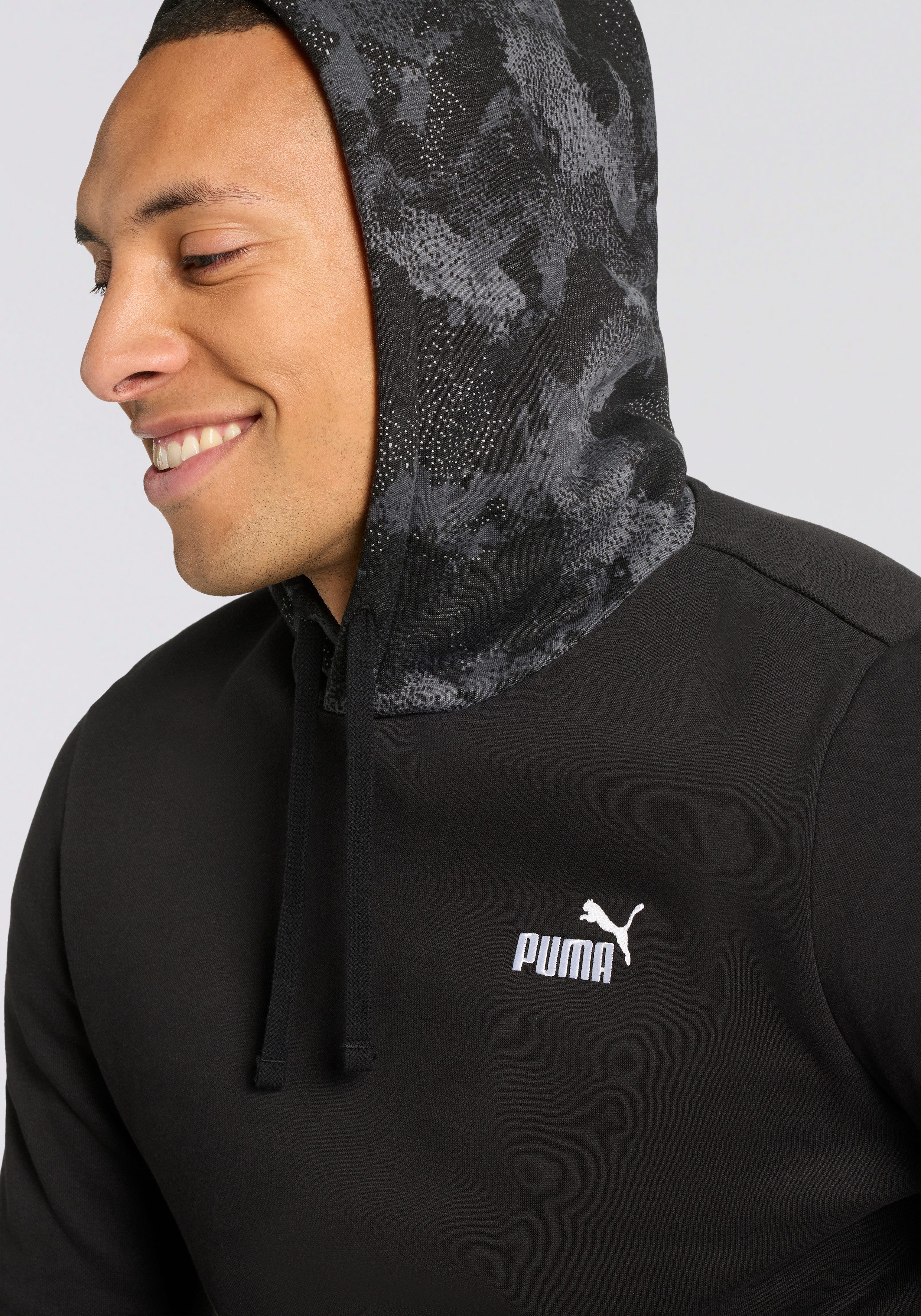 PUMA Kapuzensweatshirt ESS CAMO HOODIE FL Regular Fit, sportlicher Stil, mit Kapuze, mit Kängurutasche