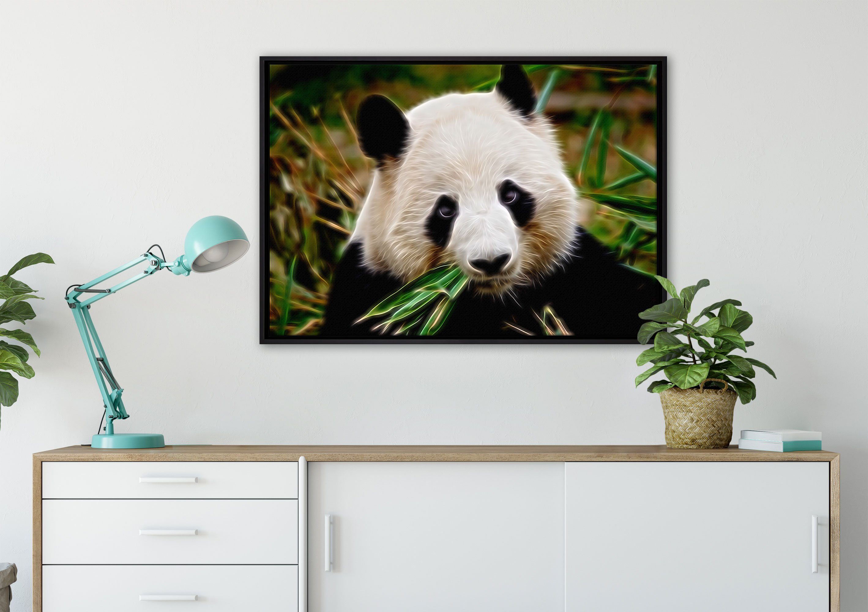 Pixxprint Leinwandbild Kuscheliger gefasst, Leinwandbild frisst Schattenfugen-Bilderrahmen inkl. in fertig Zackenaufhänger Wanddekoration Bambus, einem bespannt, (1 Panda St)