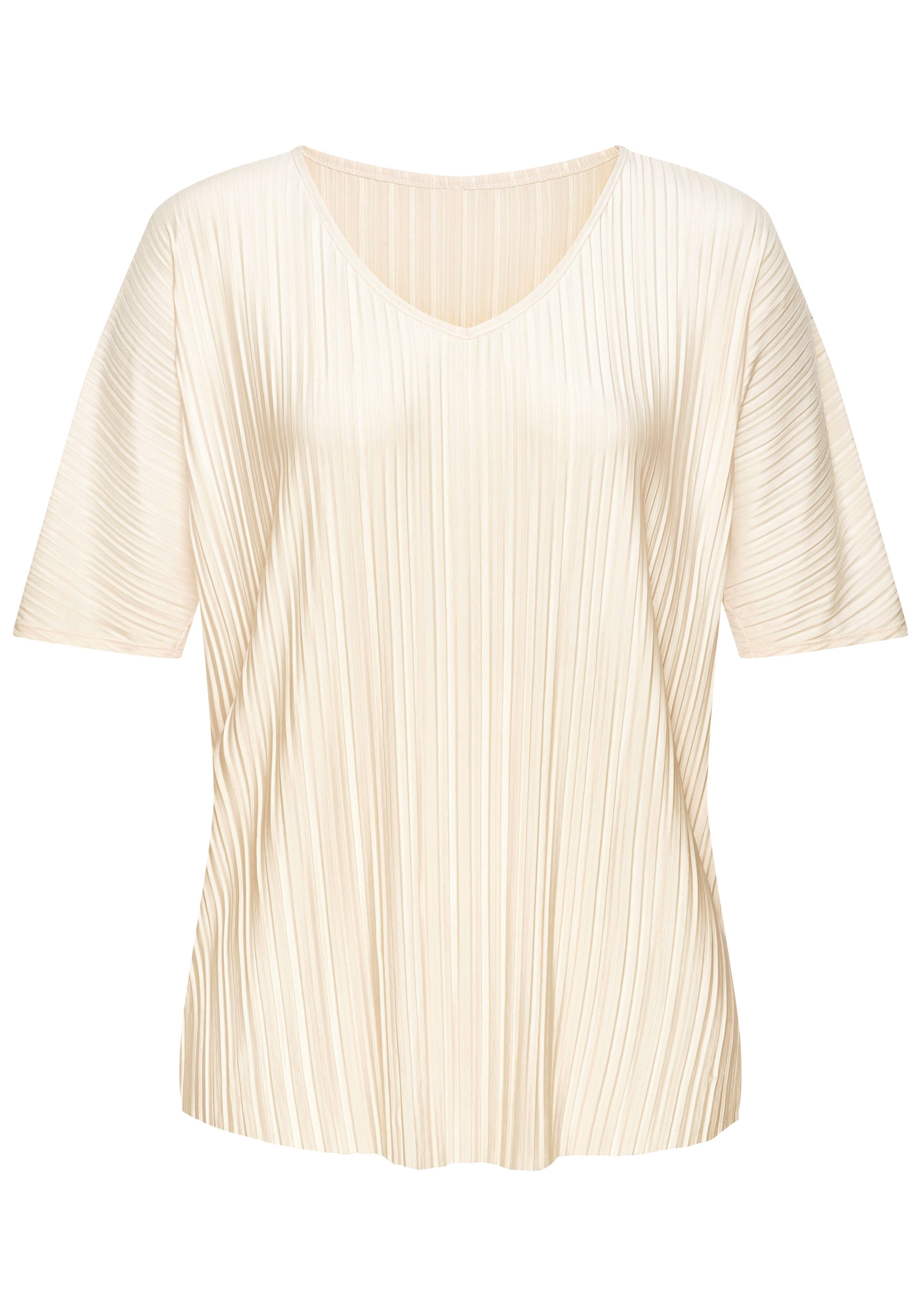 LASCANA Plisseeshirt aus schimmernder Ware. € 29,99
