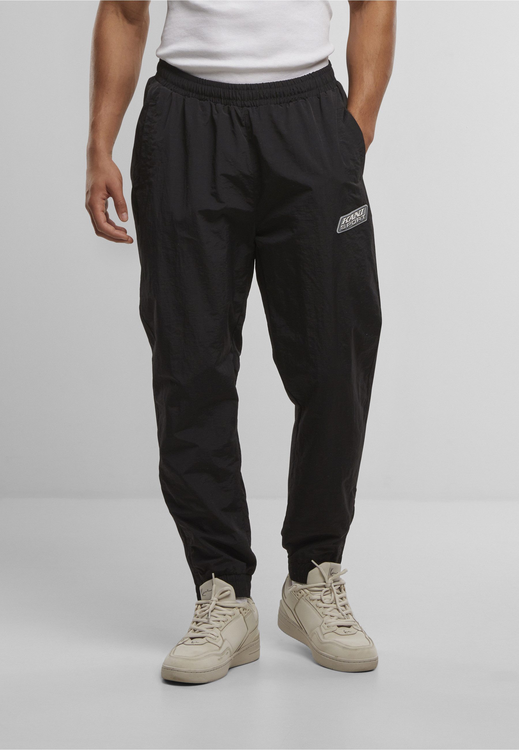 Karl Kani Jogginghose Karl Kani KK Sport Patch Essential Trackpants (1-tlg)