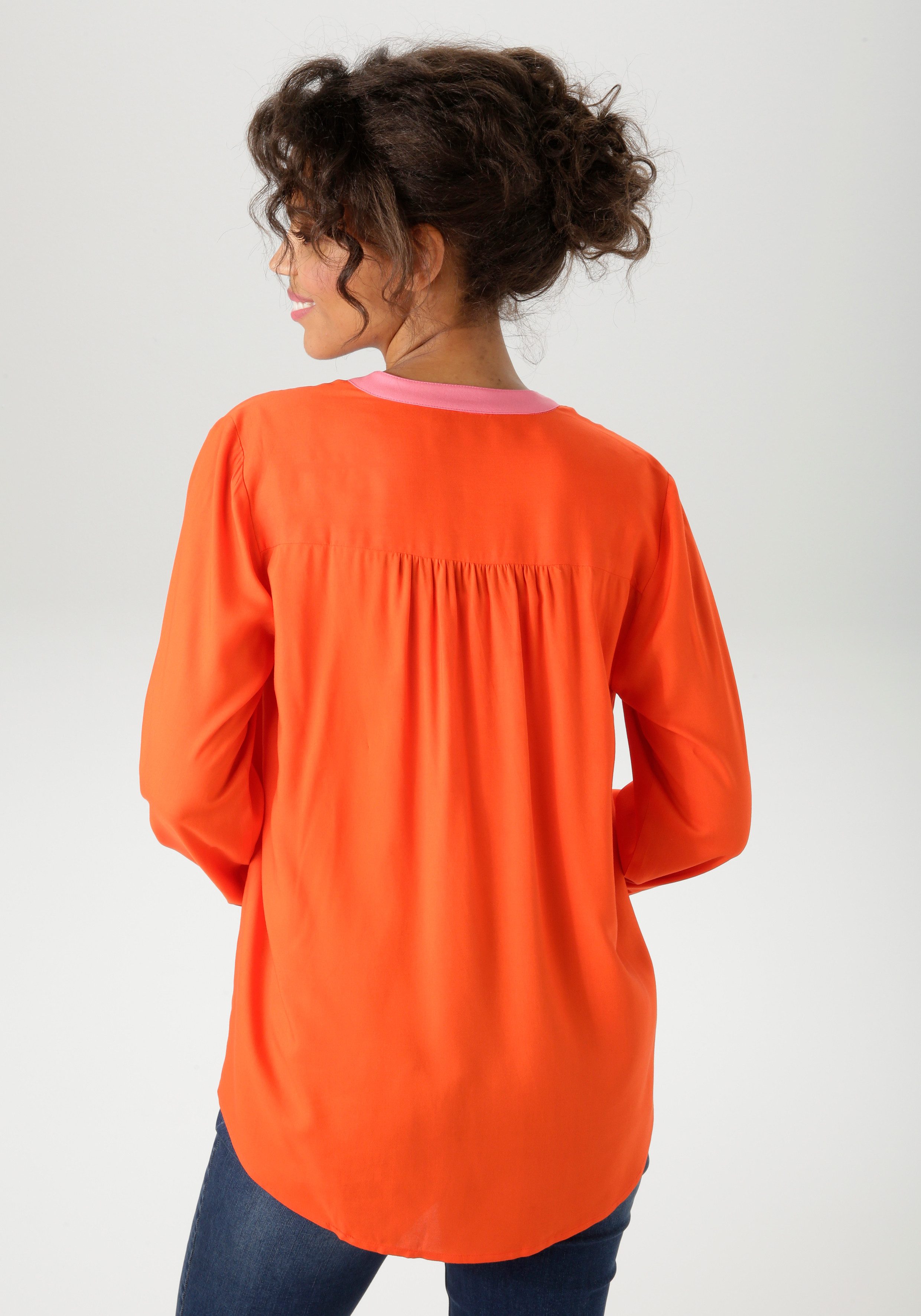 Aniston CASUAL Schlupfbluse mit pinkfarbenen Akzenten günstig online kaufen