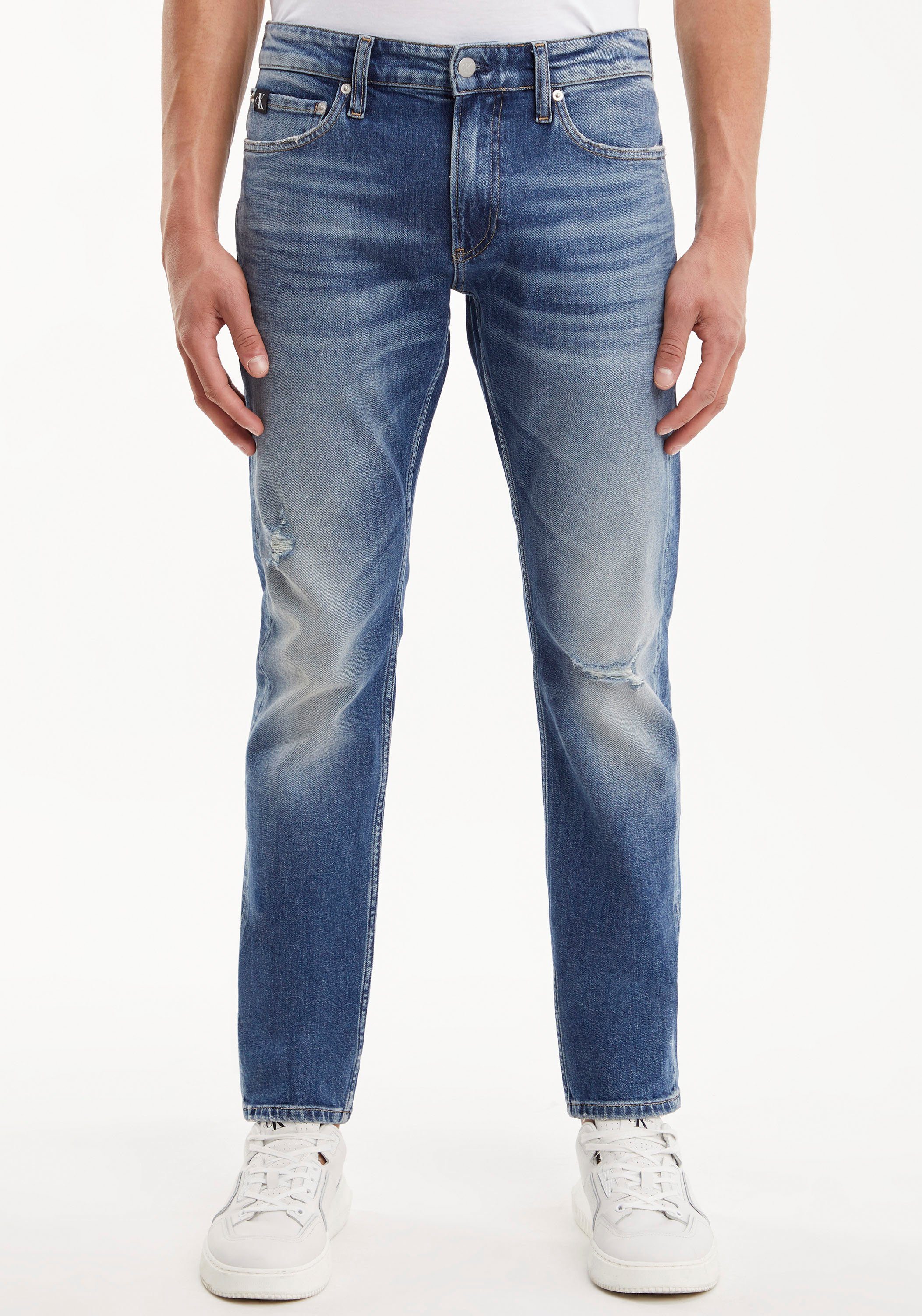 Calvin Klein Jeans Slim-fit-Jeans SLIM mit Calvin Klein Leder-Badge, Mit  Calvin Klein Leder-Badge | Tapered Jeans
