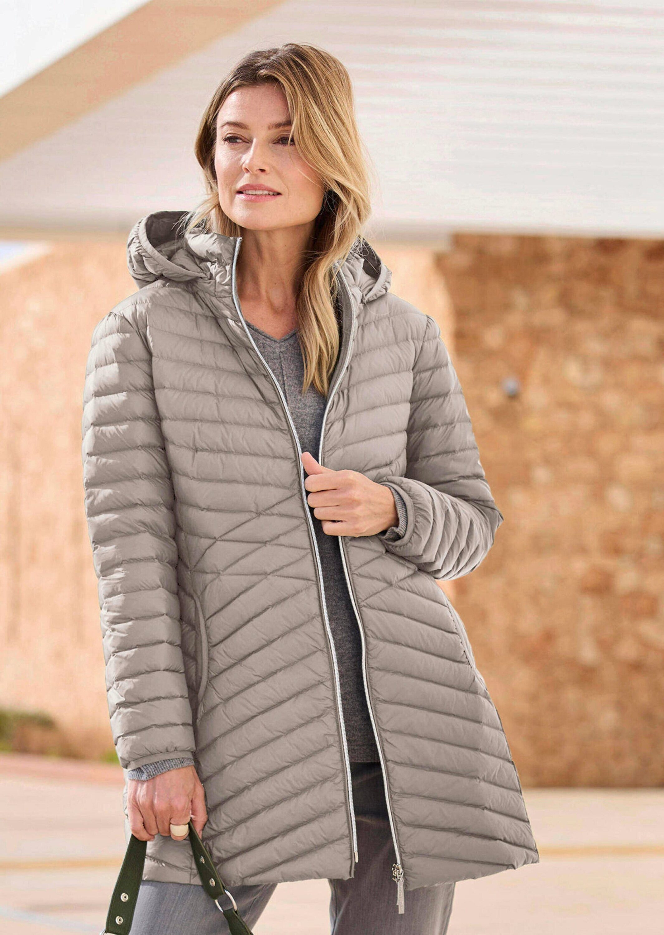 GOLDNER Winterjacke Gefütterter langer Mantel mit Kapuze Wintermantel in femininer Steppung mit Stehkragen und Taschen
