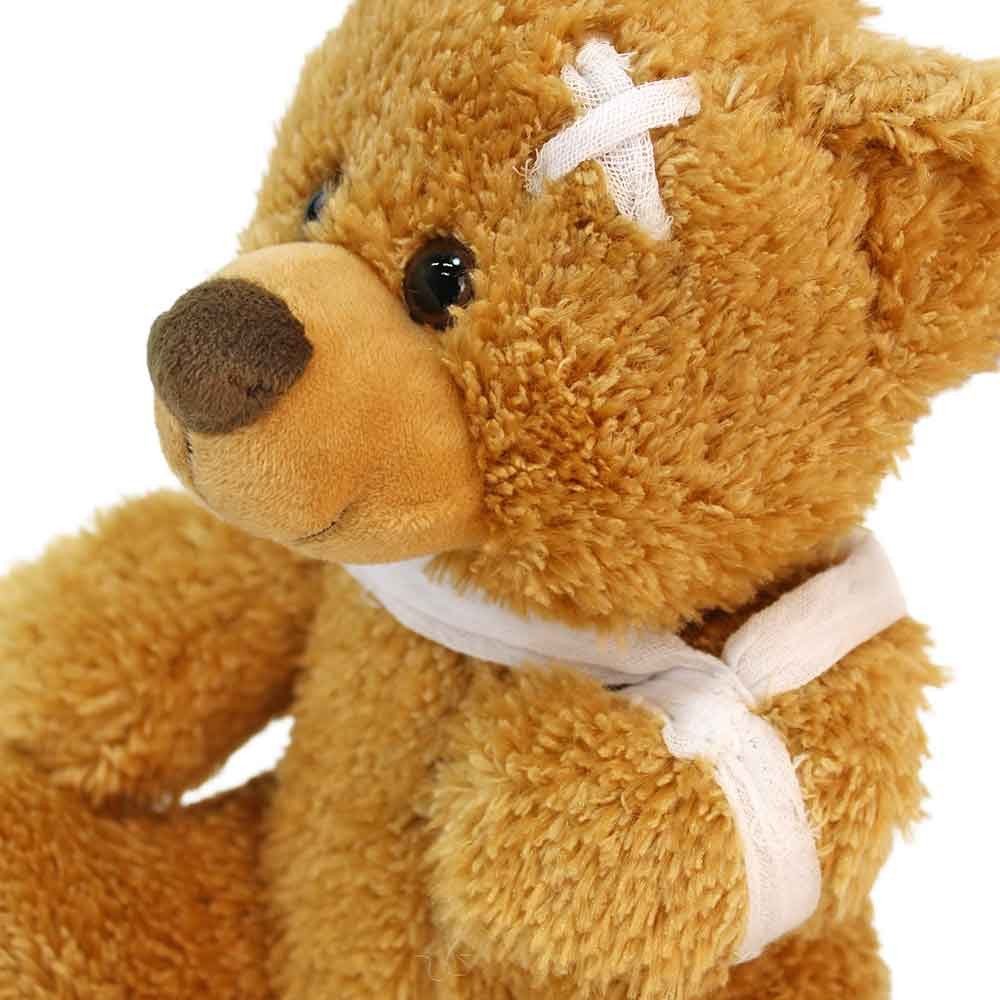 Euro Souvenirs Kuscheltier Unfall Teddy mit Verband "Jan" - ca. 22 cm (1-St)