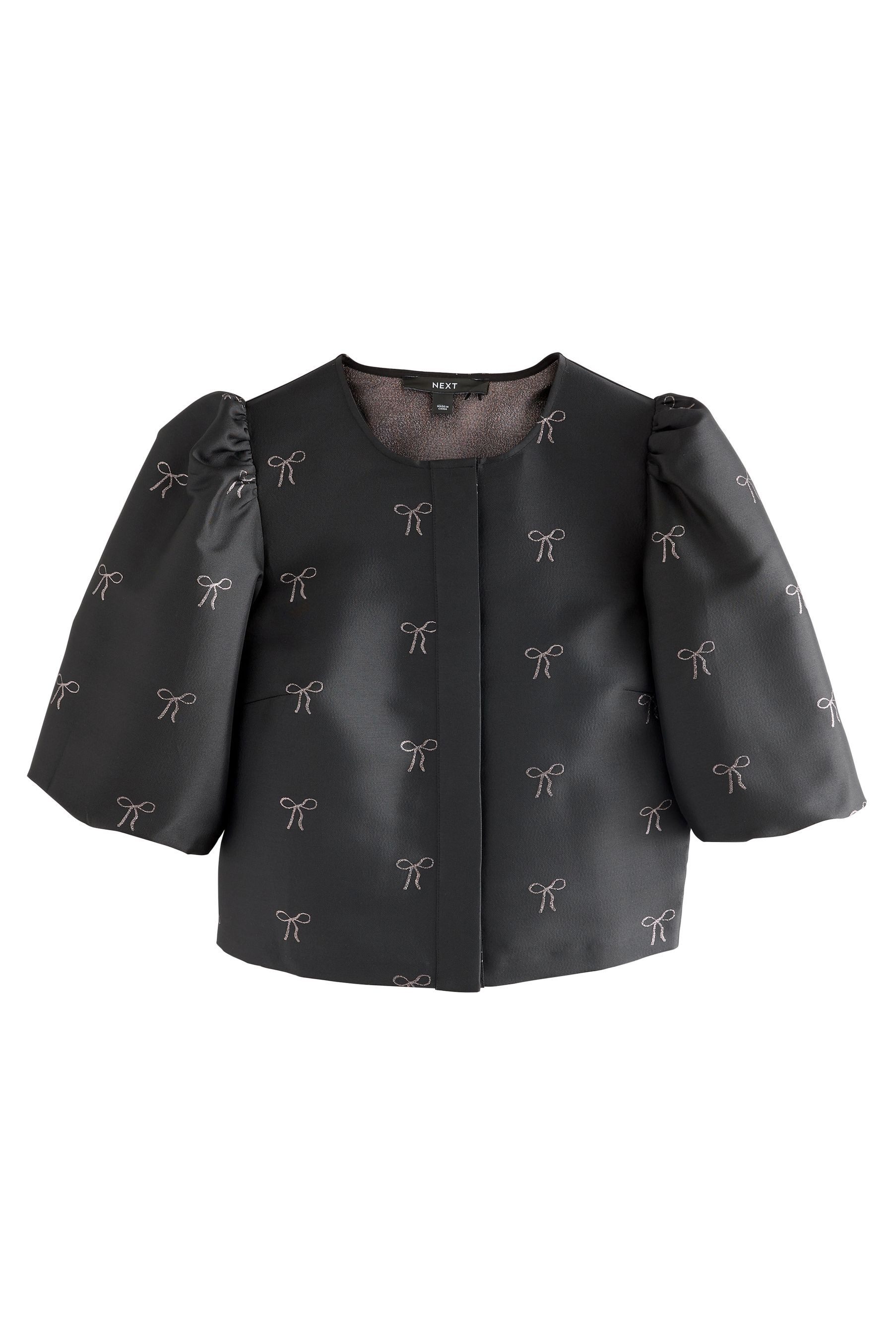 Next Kurzarmbluse Jacquard-Bluse mit Puffärmeln und Schleife (1-tlg) günstig online kaufen