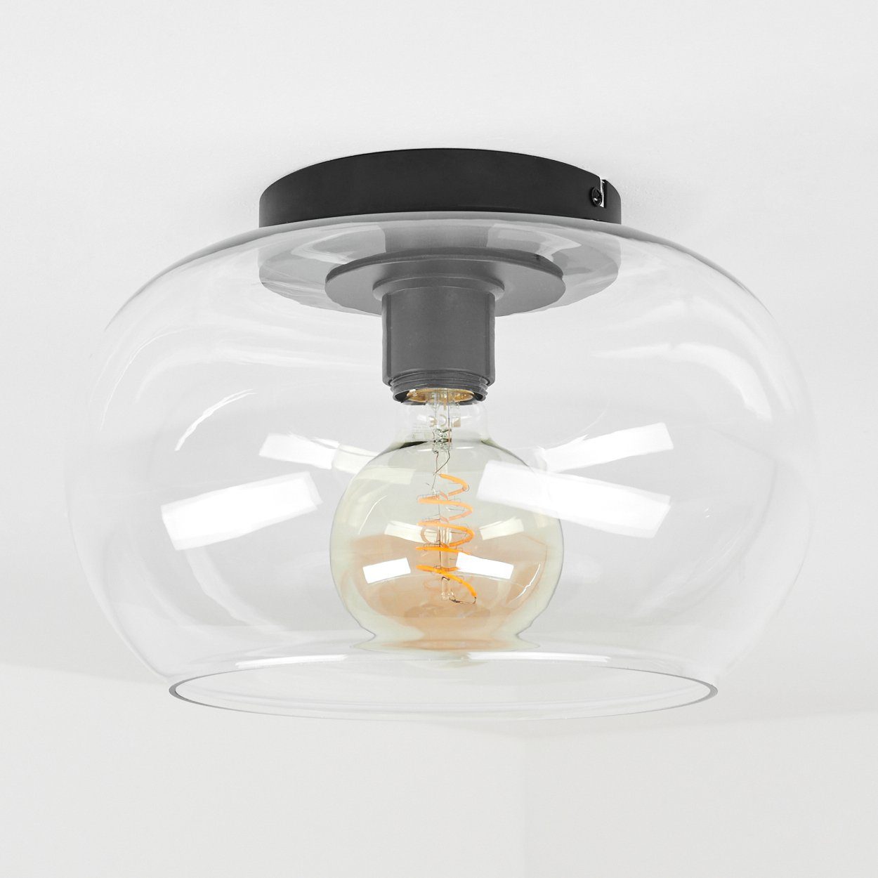hofstein Deckenleuchte »Cardeto« moderne Deckenlampe aus Metall/Glas in Schwarz/Klar, ohne Leuchtmittel, Leuchte im Retro/Vintage-Design mit Schirm aus Glas (31cm), 1xE27. Reduzierter Preis € 59,99. Unverbindliche Preisempfehlung € 79,90