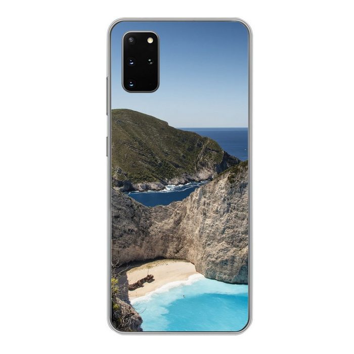 MuchoWow Handyhülle Die griechische Flagge weht über dem Strand von Navagio in Phone Case Handyhülle Samsung Galaxy S20 Plus Silikon Schutzhülle
