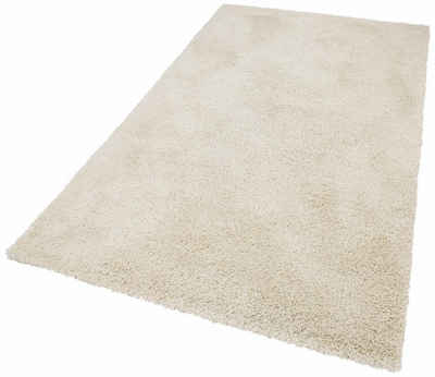 flauschige Teppiche einrichtung modern glas couchtisch weiße möbel