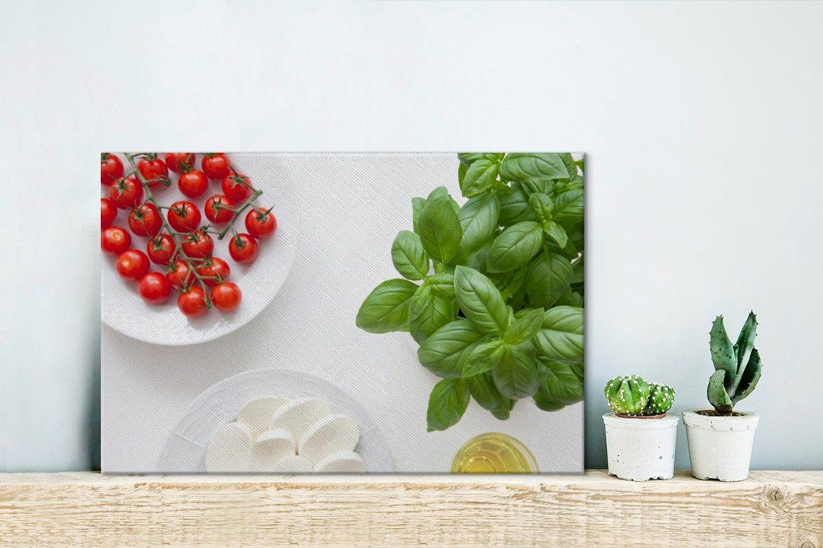 OneMillionCanvasses® Leinwandbild Basilikumpflanze mit Tomaten Aufhängefertig, Wandbild (1 und Mozzarella, cm Wanddeko, 30x20 St), Leinwandbilder