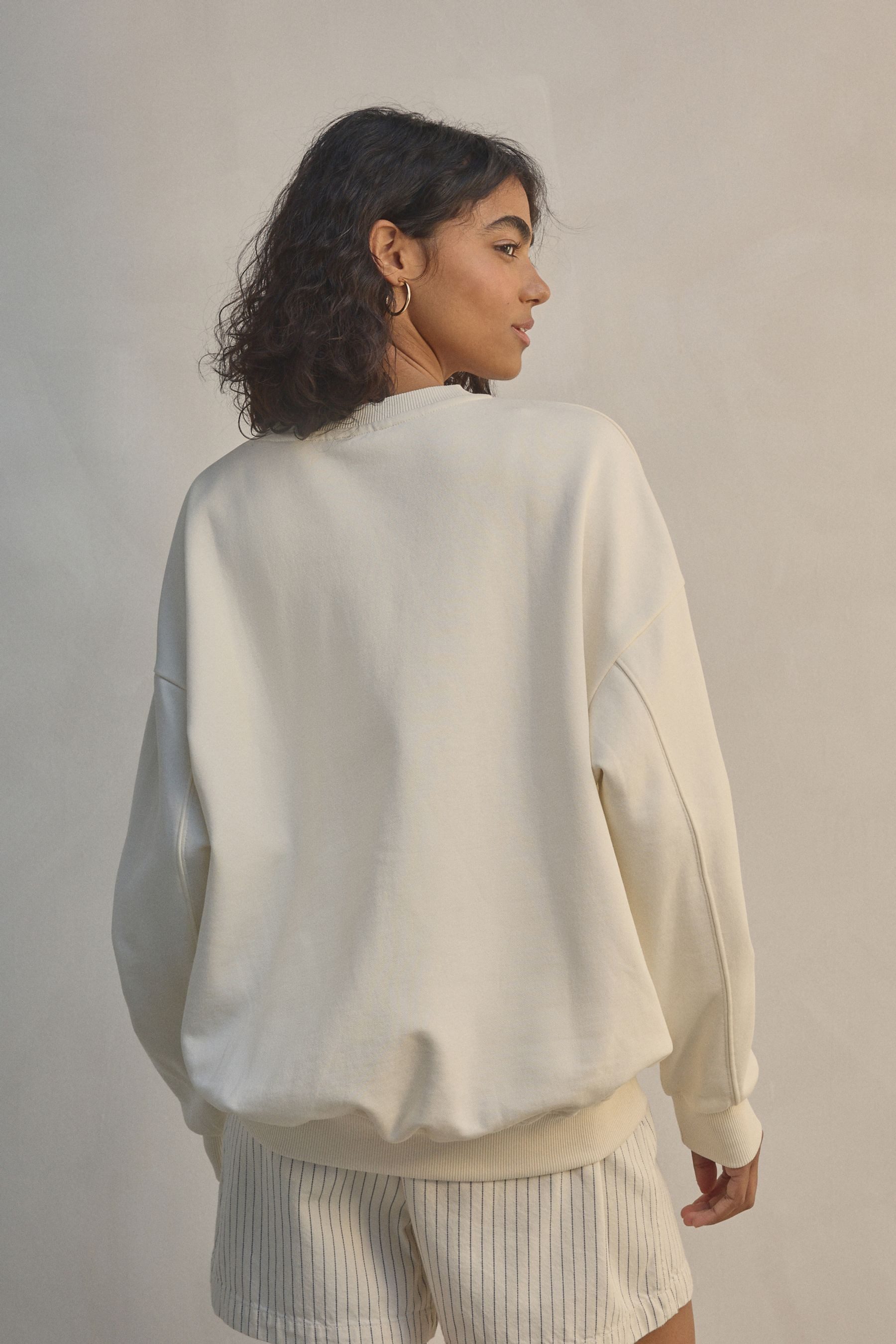 Next Sweater Rundhalssweatshirt mit Flockdruck-Grafik (1-tlg) günstig online kaufen