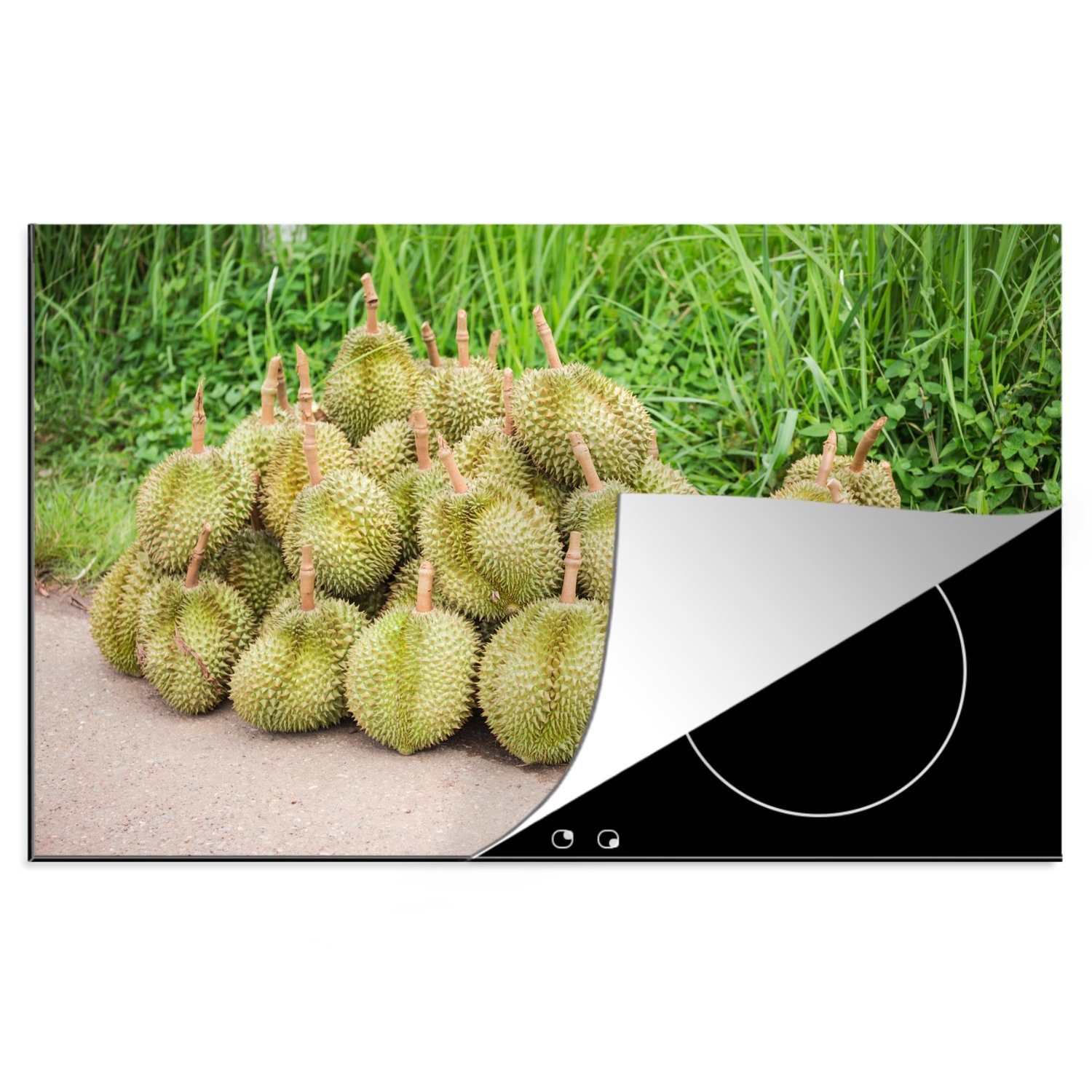 MuchoWow Herdblende-/Abdeckplatte Ein Haufen frischer Durian auf der Straße in den Tropen, Vinyl, (1 tlg), 81x52 cm, Induktionskochfeld Schutz für die küche, Ceranfeldabdeckung