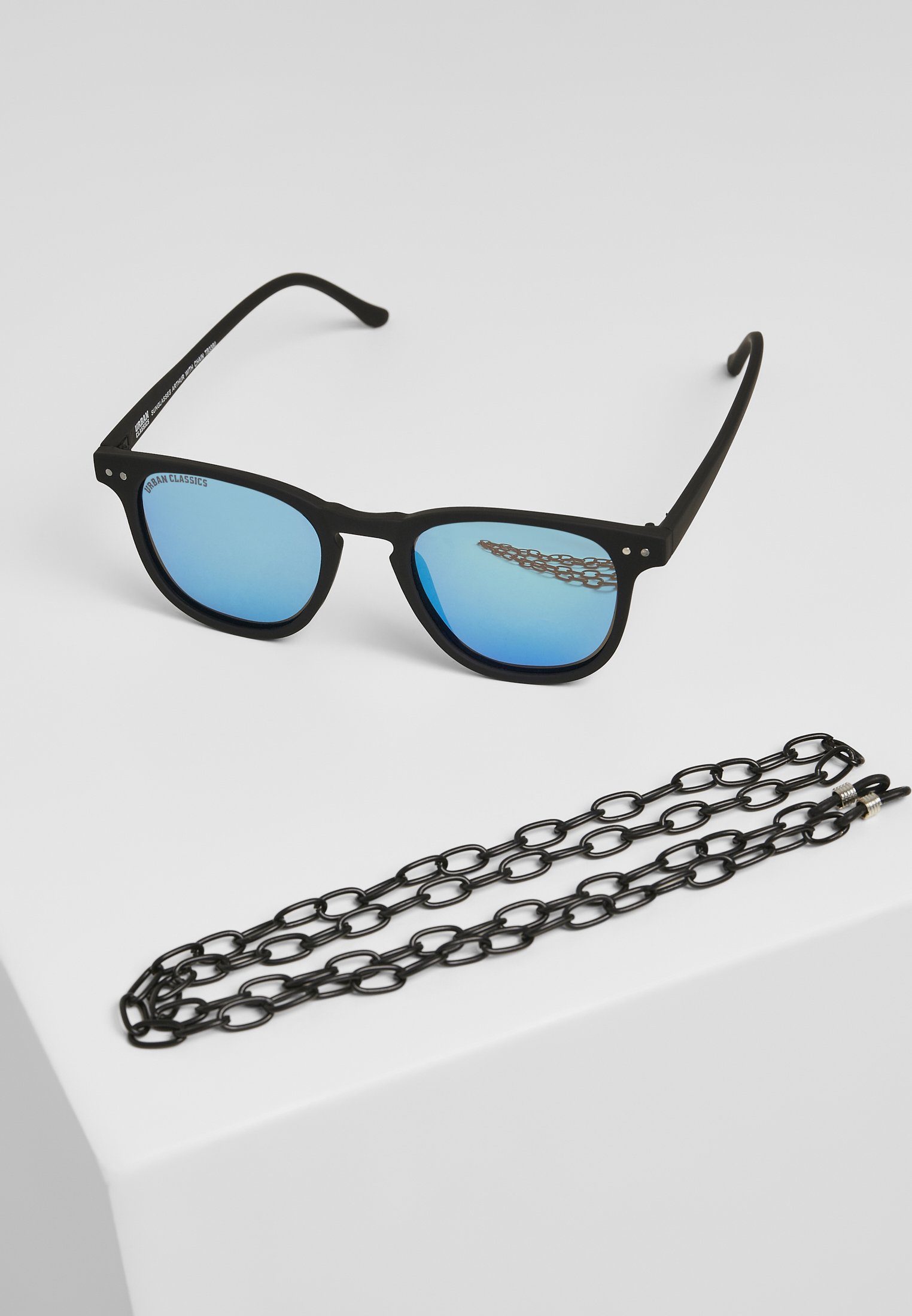 URBAN CLASSICS Sonnenbrille Unisex Sunglasses Arthur with Chain black/blue | Sonnenbrillen