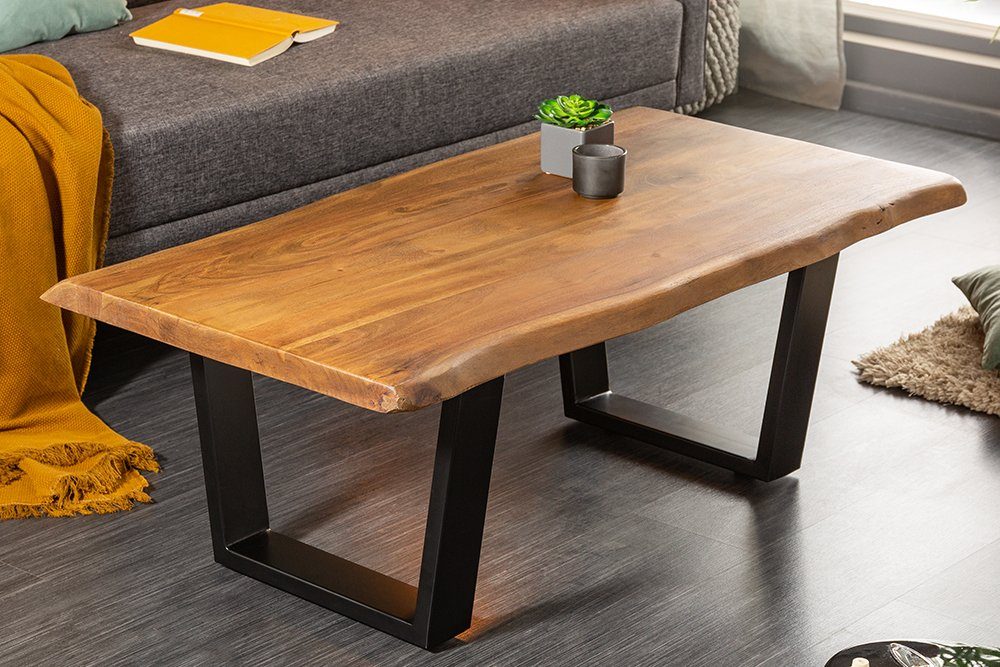 riess-ambiente Couchtisch MAMMUT 110cm honigfarben / schwarz (Einzelartikel, 1-St), Wohnzimmer · Massivholz · Baumkante · 3,5cm Tischplatte · Metall