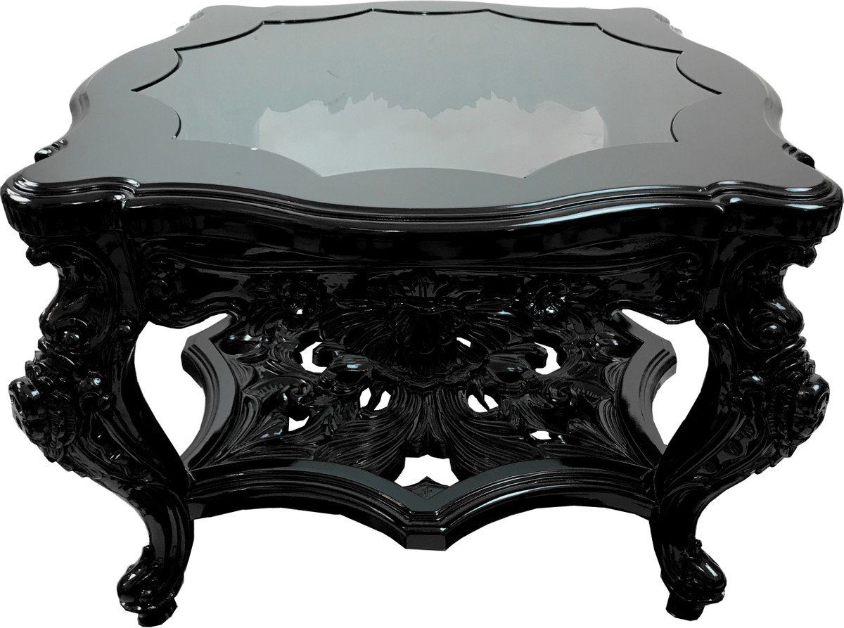 Casa Padrino Couchtisch Prachtvoller handgeschnitzer Luxus Barock Couchtisch Schwarz mit eingesetzter Glasplatte 76 x 76 x H 52.5 cm von Casa Padrino