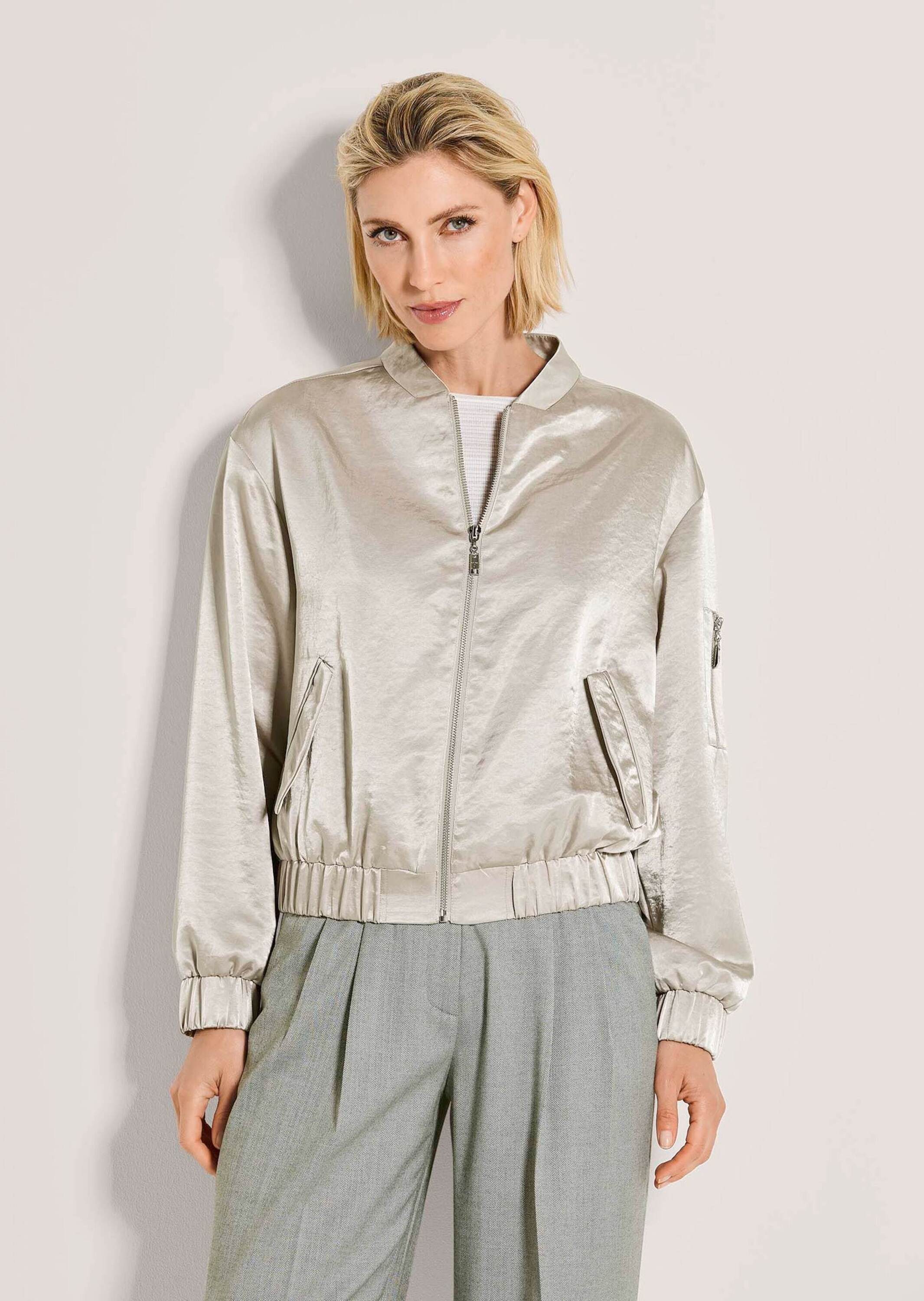 MADELEINE Outdoorjacke Elegante Glanzjacke mit Stehbund Freizeitjacke mit Reißverschluss, Pattentaschen und Langarm