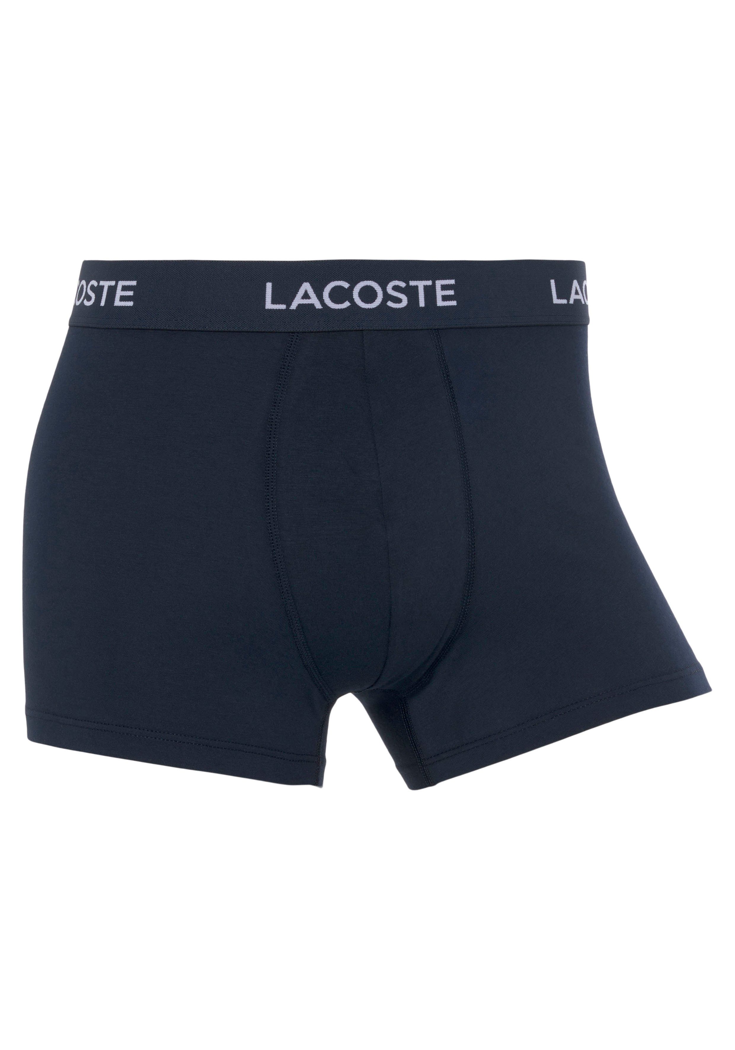 hellblau mit Lacoste Boxershorts 3-St., Bund 3er-Pack) Lacoste-Schriftzug navy/ blau/ (Packung, am