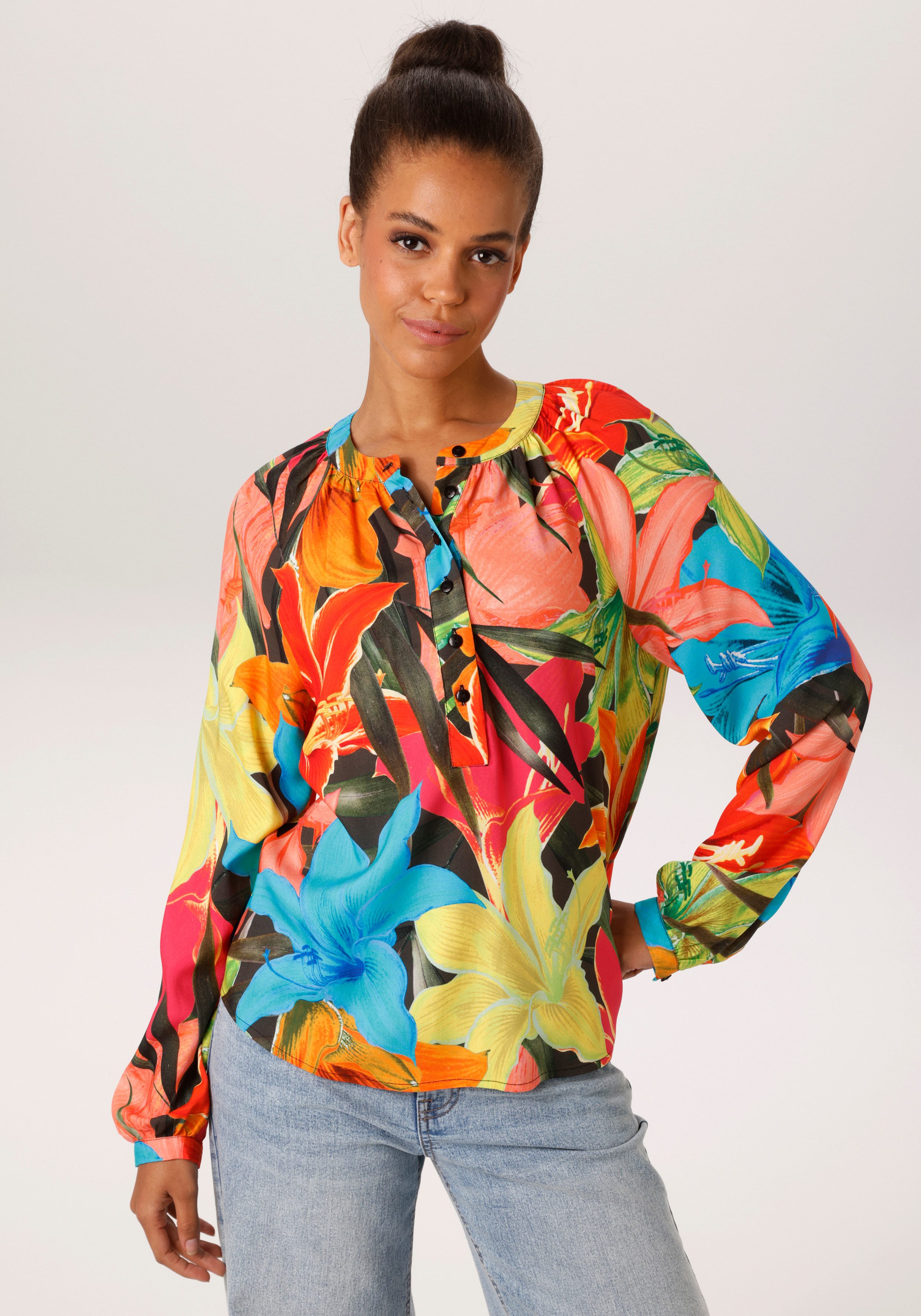 Aniston CASUAL Schlupfbluse mit farbenfrohen, großflächigen Blüten bedruckt - NEUE KOLLEKTION. € 39,99, (€ 39,99 pro 1 Stk).