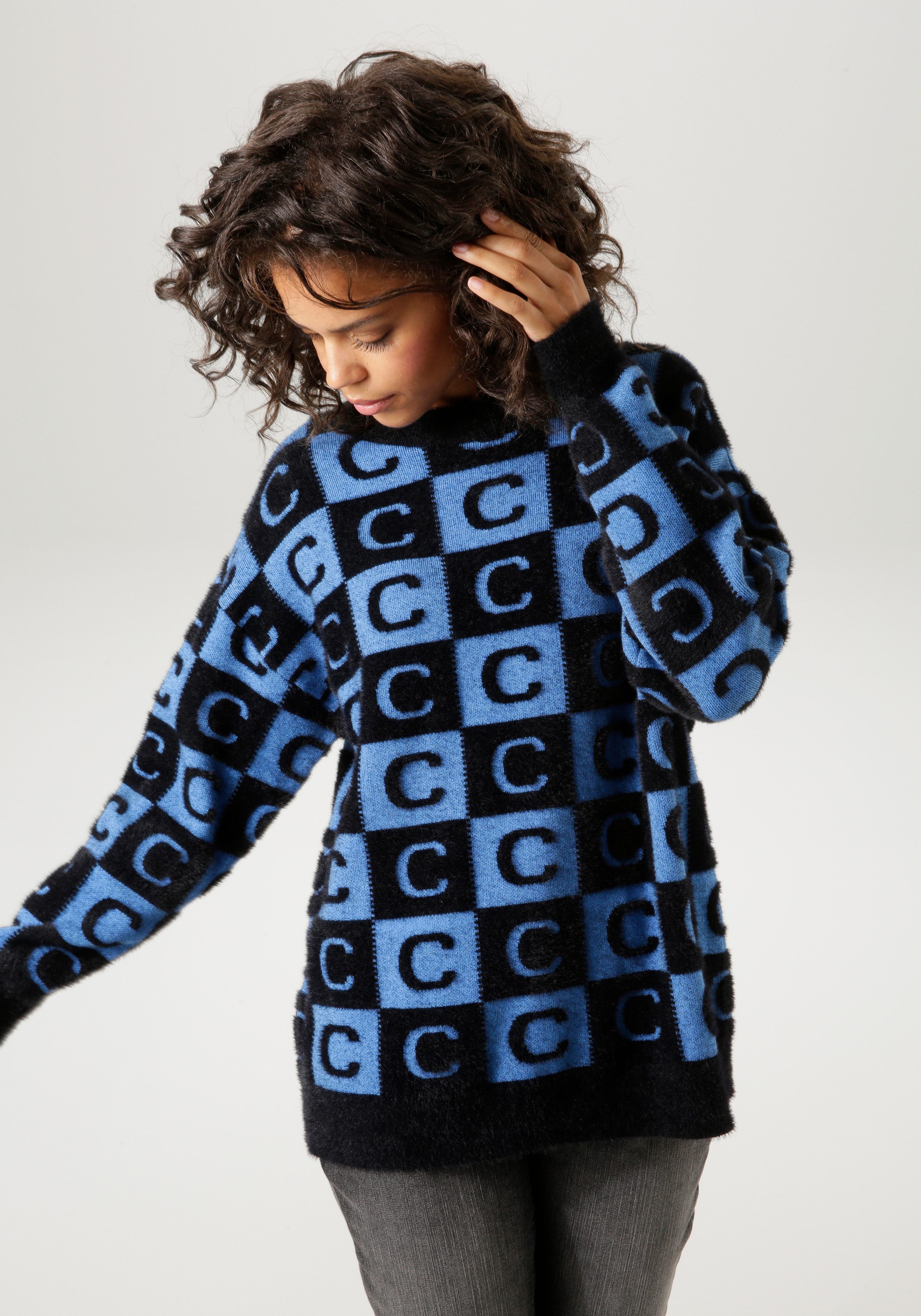 Aniston CASUAL Strickpullover mit extravaganten 2-farbigen Quadraten günstig online kaufen