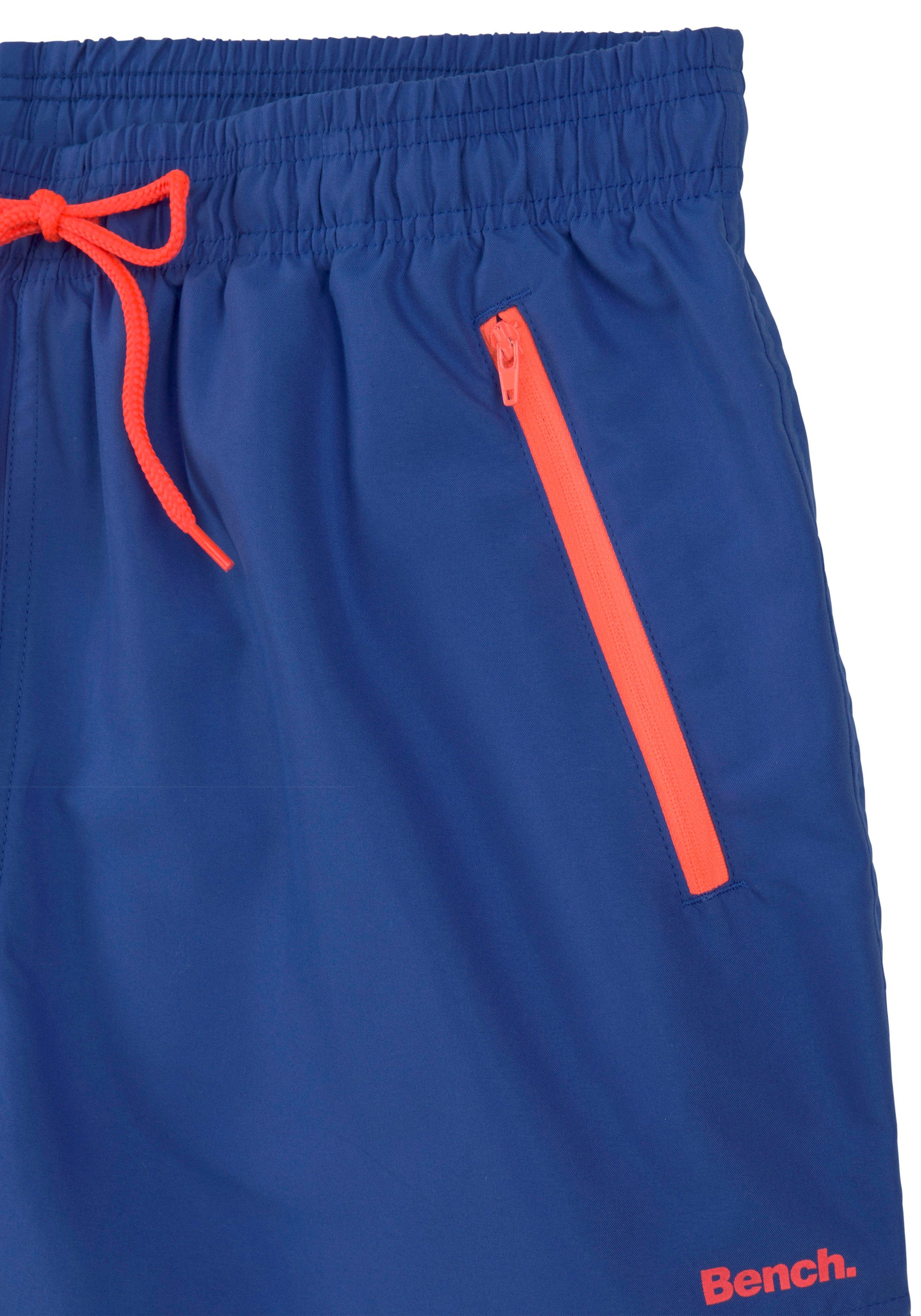 mit Bench. Reißverschlusstaschen Badeshorts blau-orange