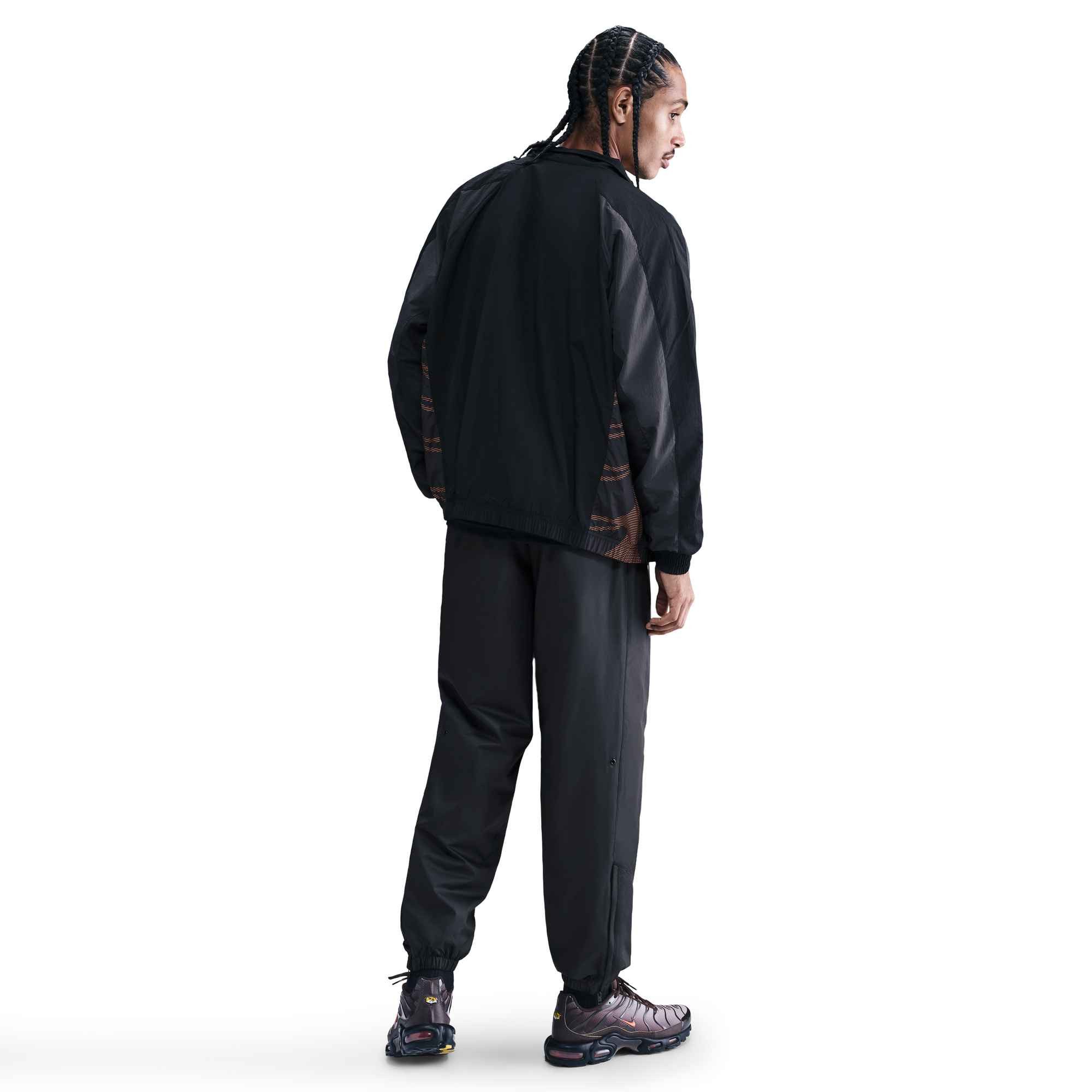 Nike Sportswear Sporthose Nike Windrunner Men's Lined Pants mit wetterfester Technologie
