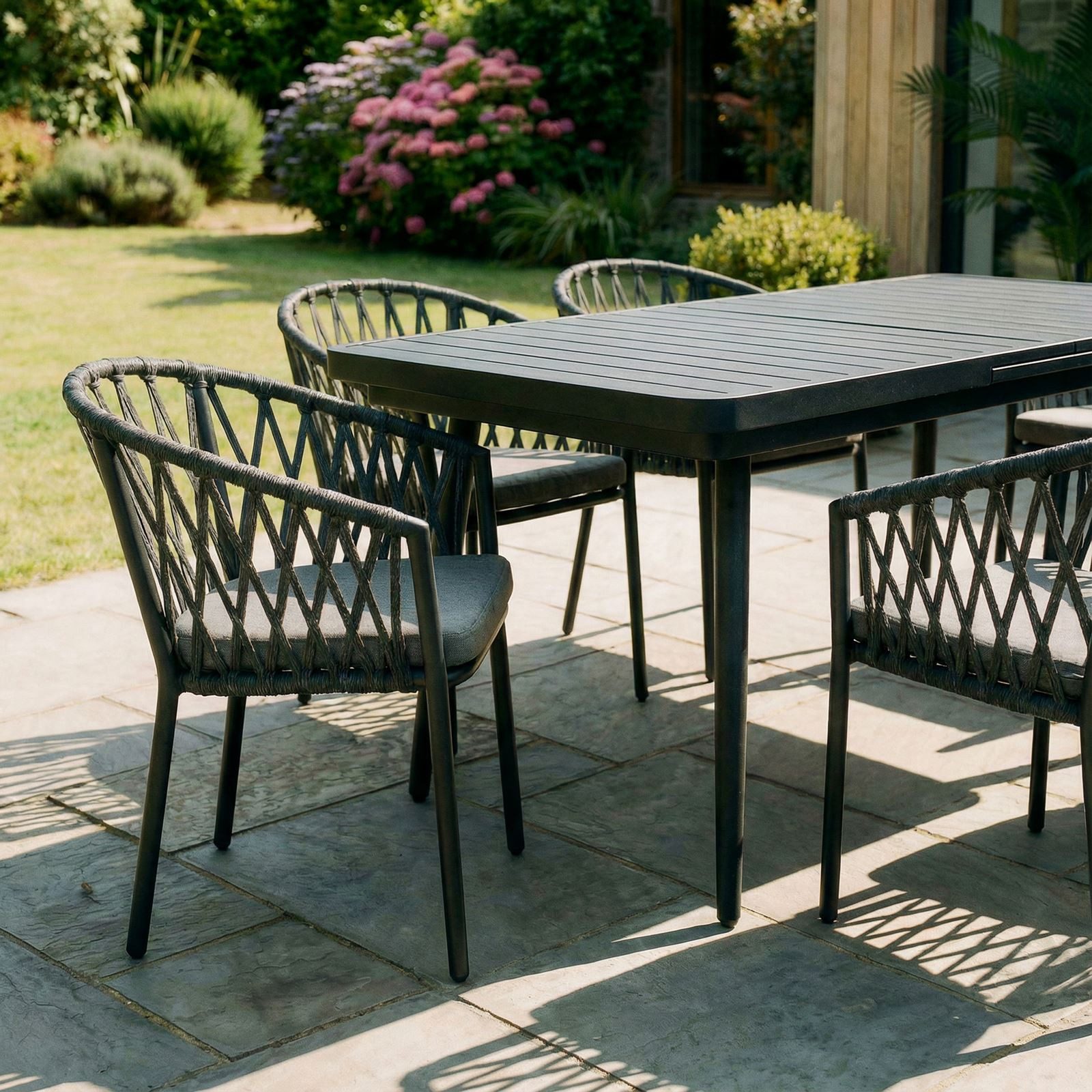 IDIMEX Garten-Essgruppe SUNNY, (7-tlg), Gartenmöbel Set mit 6 Stühlen & ausziehbarem Tisch schwarz/grau