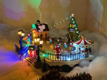e4fun Weihnachtsdorf Eislaufplatz mit LED Beleuchtung,Musik und sich bewegenden Eisläufern