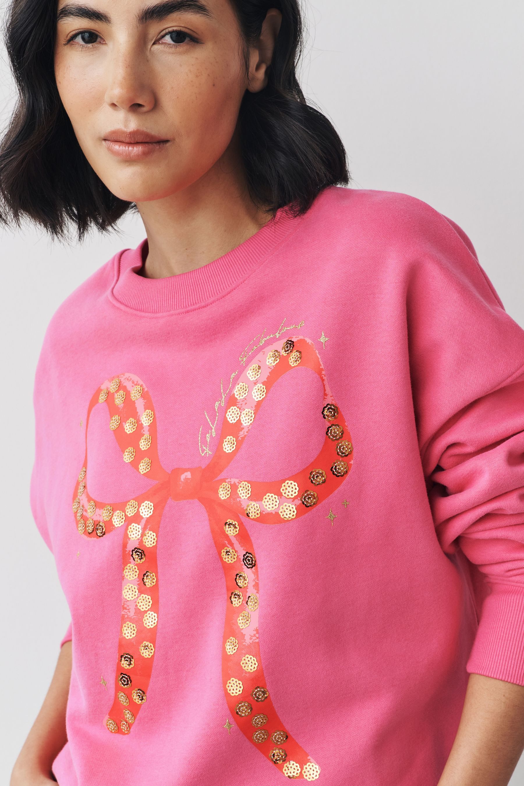 Next Sweater Sweatshirt mit Schleifengrafik + Pailletten (1-tlg) – Bild 5 von 5