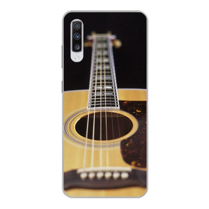 MuchoWow Handyhülle Eine liegende akustische Gitarre Phone Case Handyhülle Samsung Galaxy A70 Silikon Schutzhülle