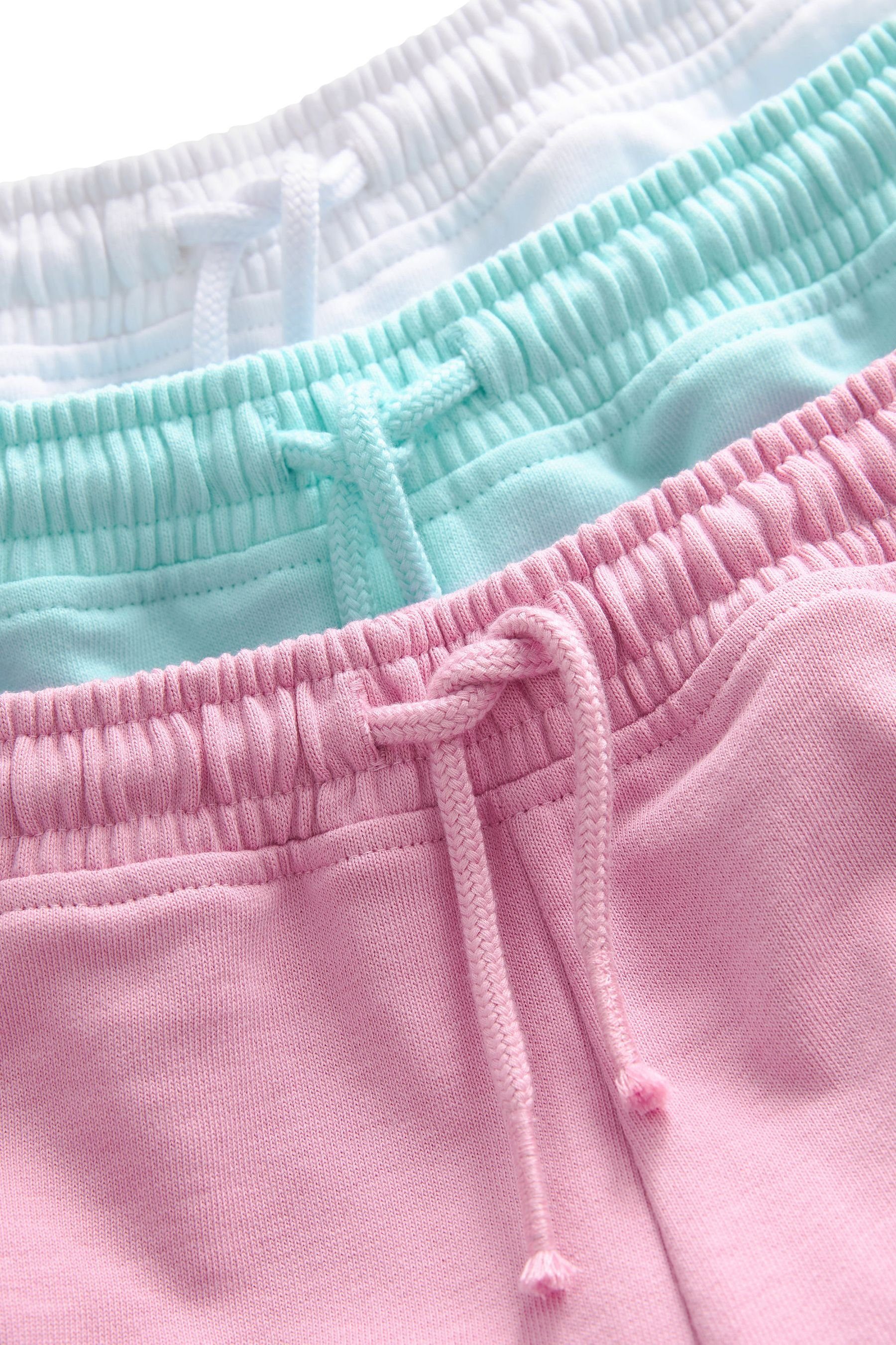 (3-tlg) Baumwolljersey, Pastel Pink/Mint Sweatshorts 3er-Pack aus Green/White Next Shorts