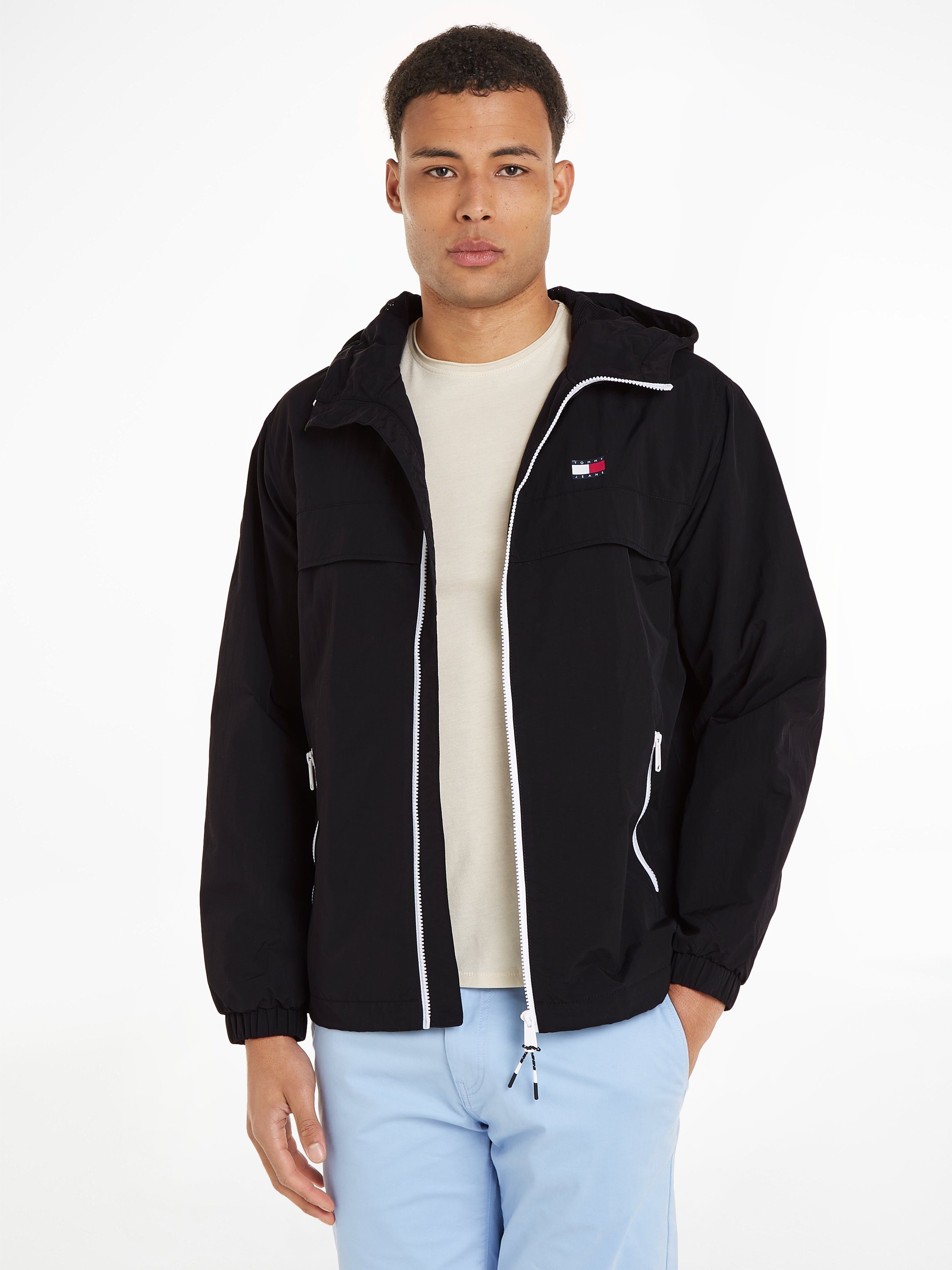 Tommy Jeans Blouson TJM CHICAGO WINDBREAKER EXT mit Kapuze