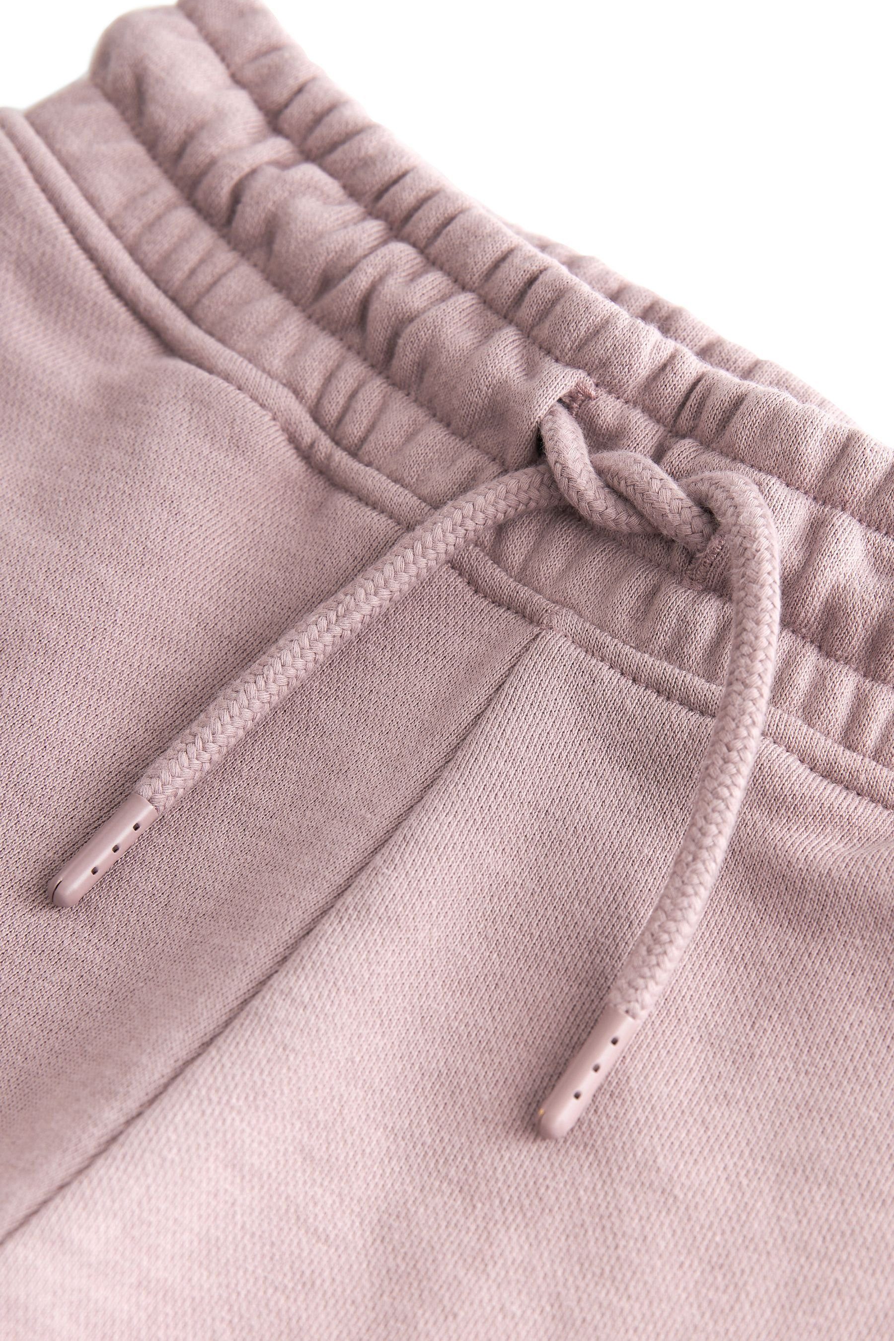 Jersey-Shorts Reißverschlusstasche (1-tlg) mit Sweatshorts Purple Next