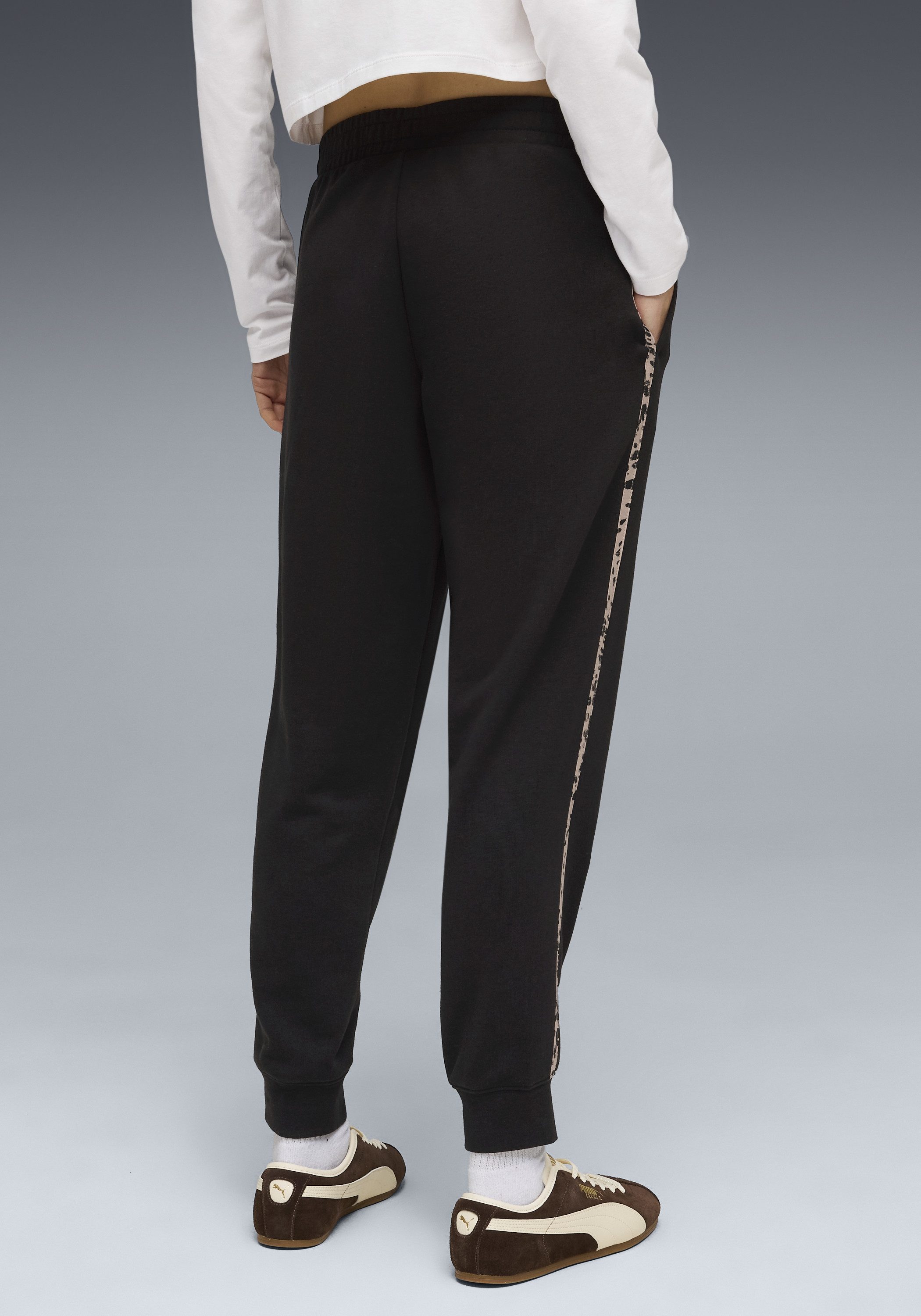 PUMA Trainingshose ESS GRAPHIC ANIMAL COMFORT PANTS TR CL mit Eingrifftaschen, sportlicher Stil, mit modernem Print