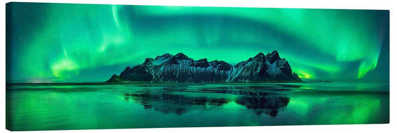 Posterlounge Leinwandbild Panoramic Images, Reflexion des grünen Polarlichts im Meer, Island, Fotografie