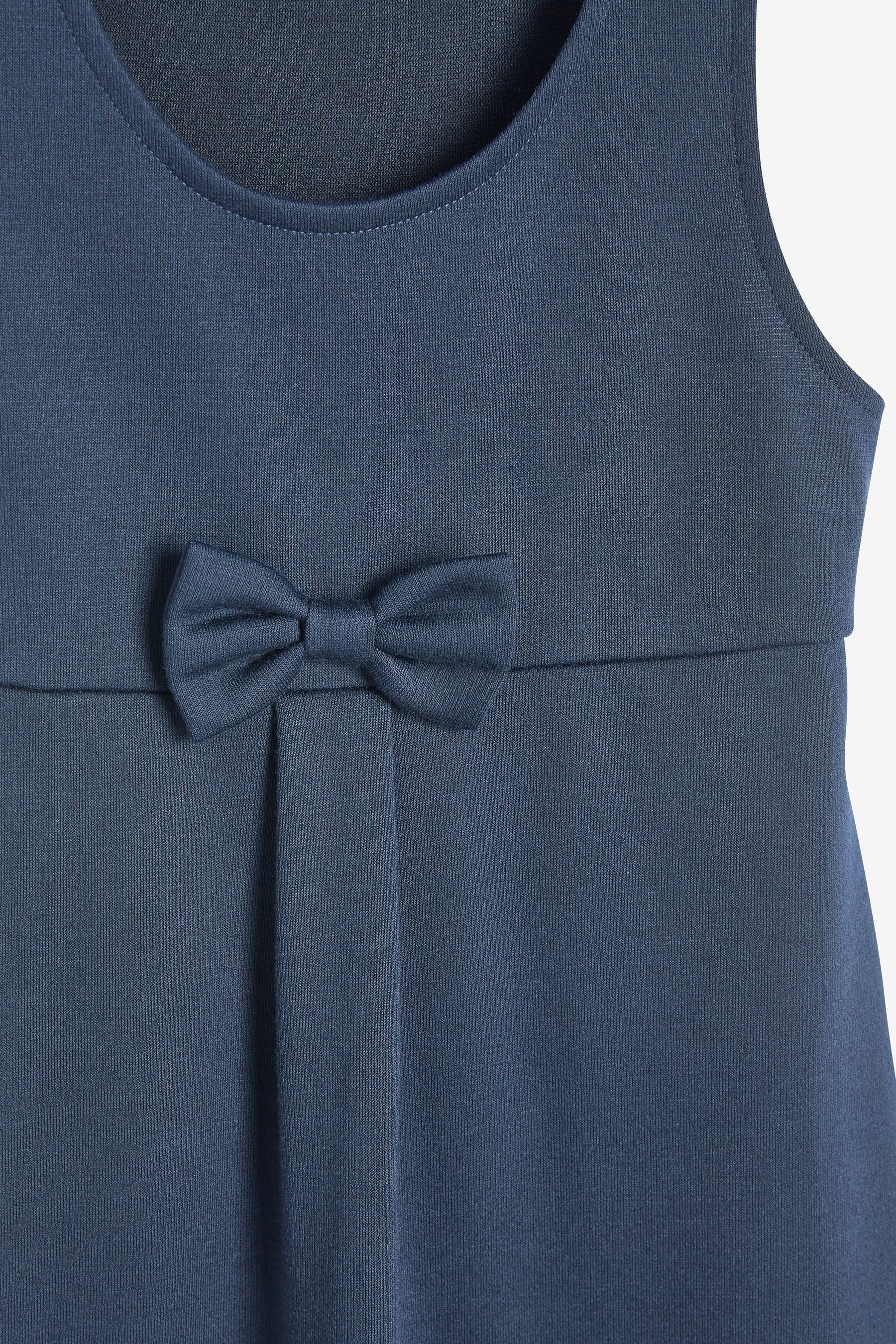 Next Latzkleid Schul-Latzkleid aus Jersey mit Zierschleife (1-tlg)