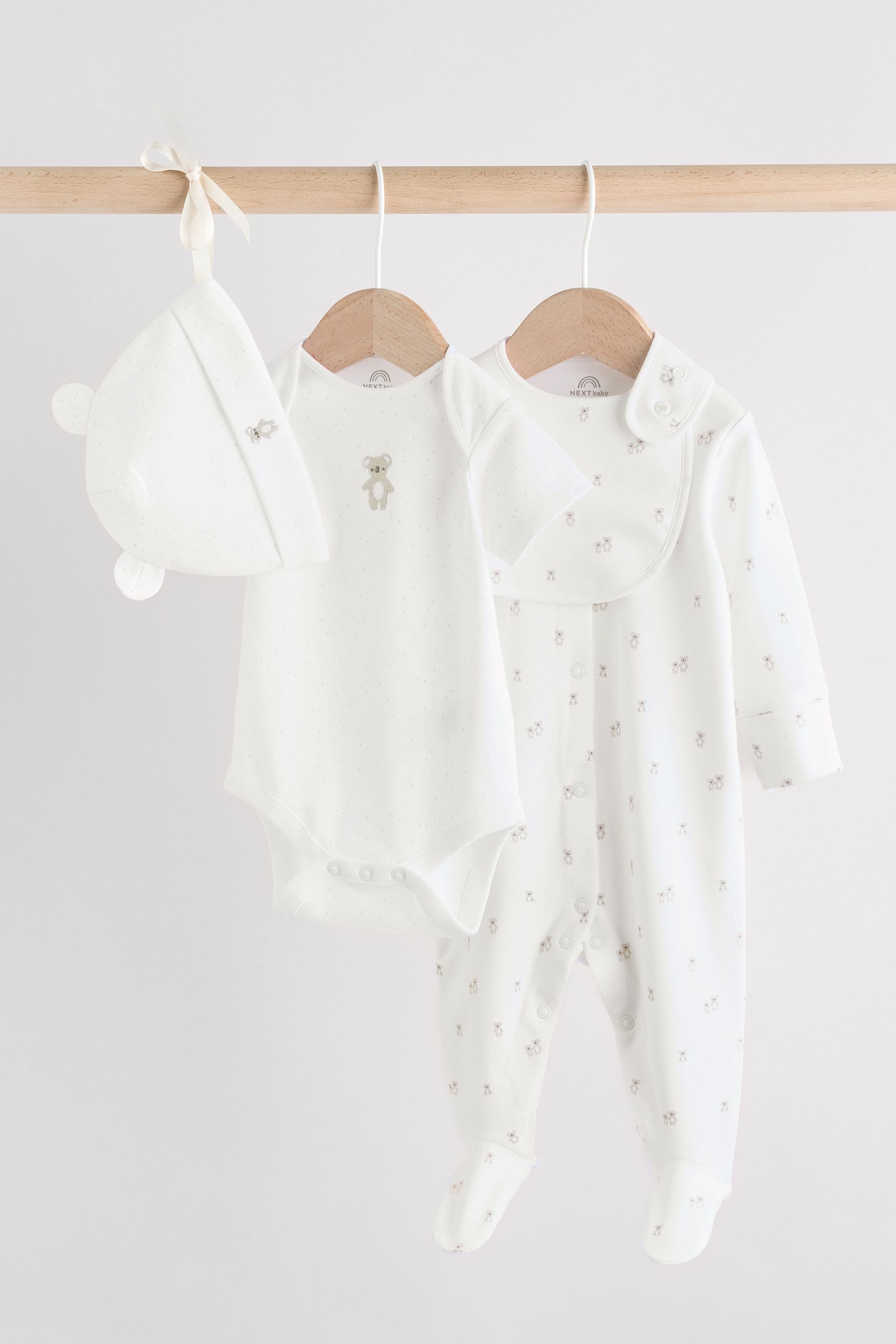 Schlafoverall Schlafanzug, Body, Mütze und Lätzchen, 4-tlg. Set