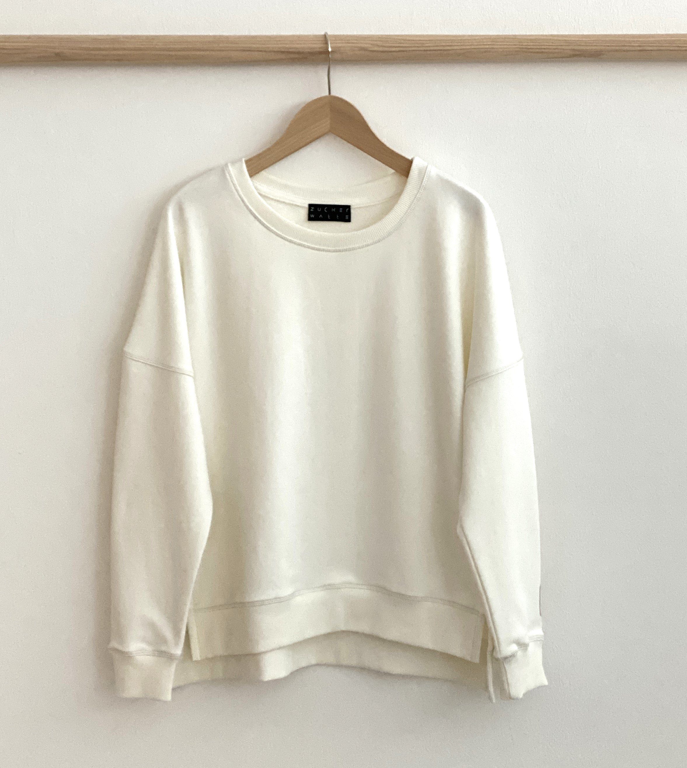 wertiger Sweatshirt aus Zuckerwatte geschlitzt ecru Baumwollmischung, mit Logoprint seitlich edlem