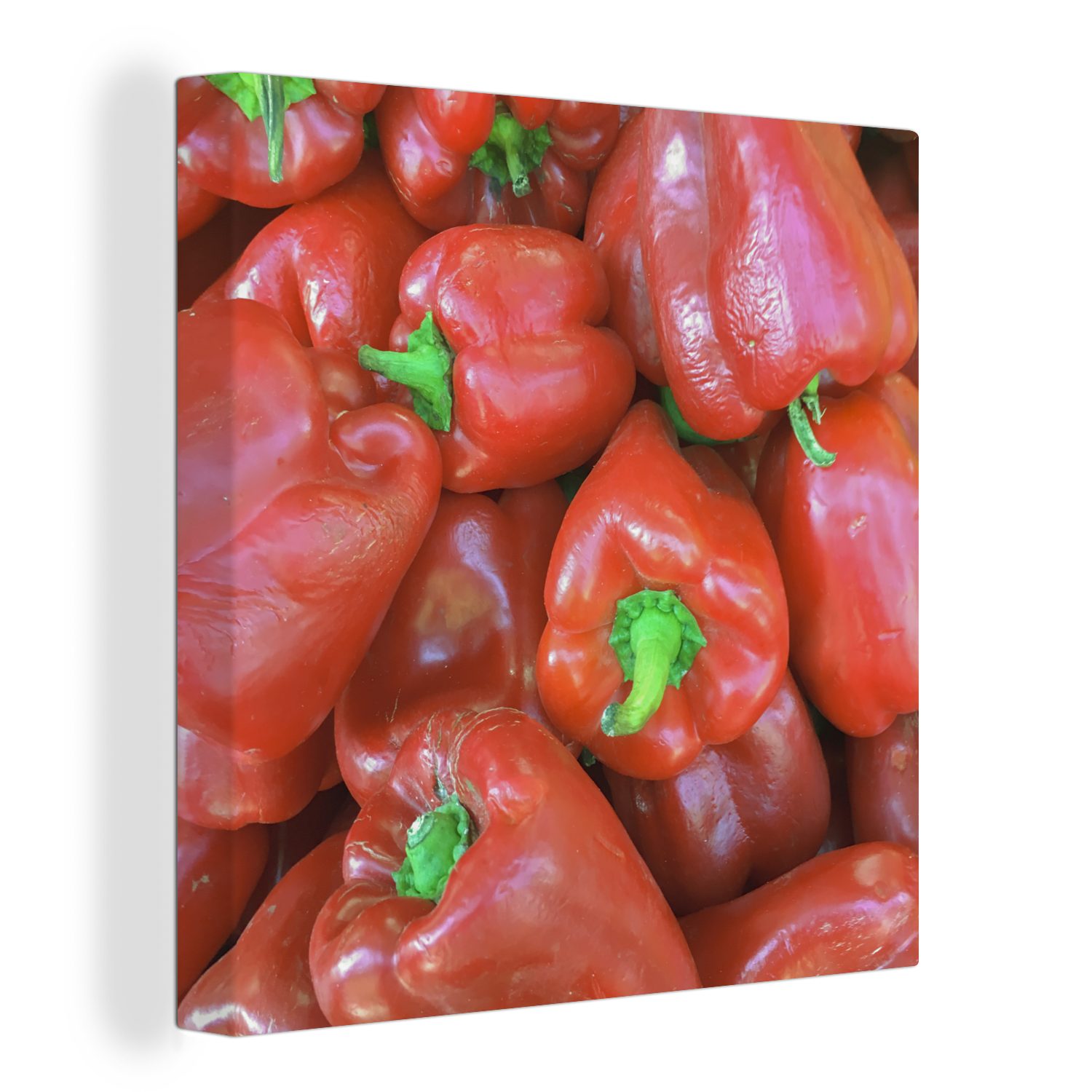 OneMillionCanvasses® Leinwandbild Ein glänzender Haufen roter Paprika, (1 St), Leinwand Bilder für Wohnzimmer Schlafzimmer