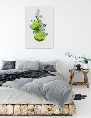 Pixxprint Leinwandbild Leckere grüne Limetten im Wasser, Leckere grüne Limetten im Wasser (1 St), Leinwandbild fertig bespannt, inkl. Zackenaufhänger