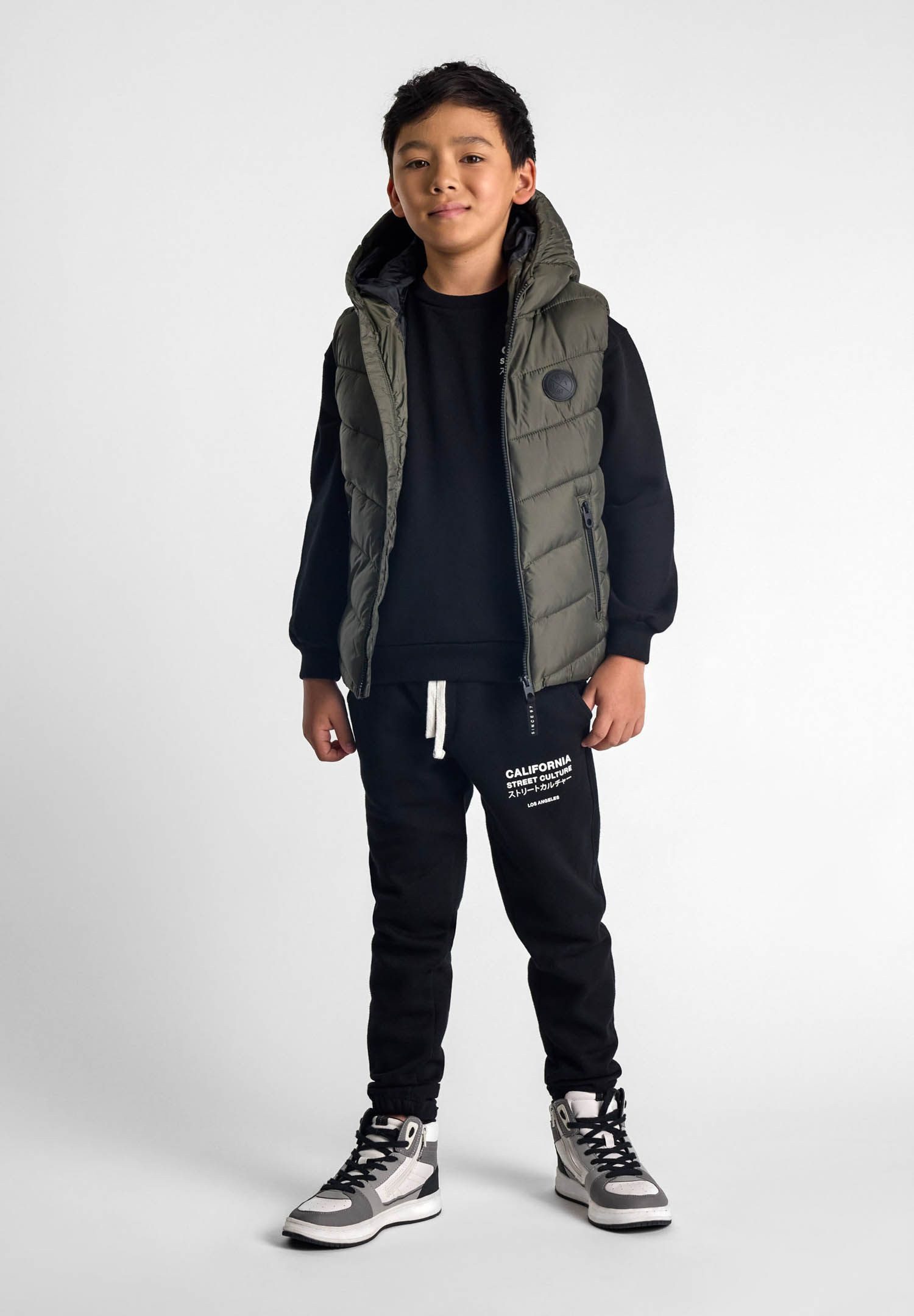 MINOTI Steppweste Steppweste mit reflektierendem Print   (2y-14y) günstig online kaufen