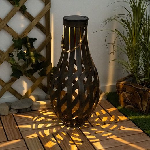 Die Garten Solarlaterne zaubert ein unvergleichliches Lichtbild in Dein Zuhause