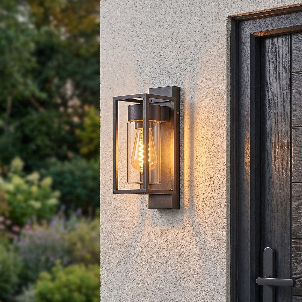 hofstein Außen-Wandleuchte Außenleuchte aus Metall/Glas in Schwarz/Klar, ohne Leuchtmittel, moderne Wandlampe für Terrasse/Hof/Eingangsbereich, 1 x E27, IP44