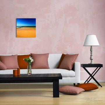 Wallario Glasbild, Sandstrand in orange - Blaues Meer - Blauer Himmel, in verschiedenen Ausführungen