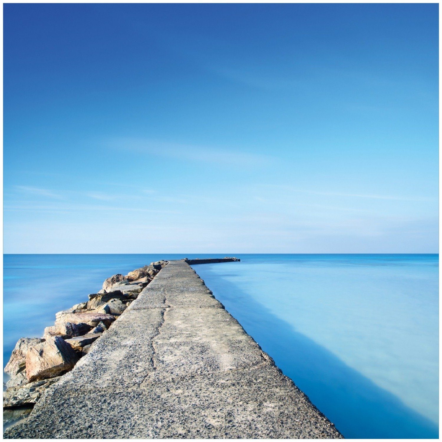 Wallario Memoboard Pier am blauen Ozean mit blauem Himmel