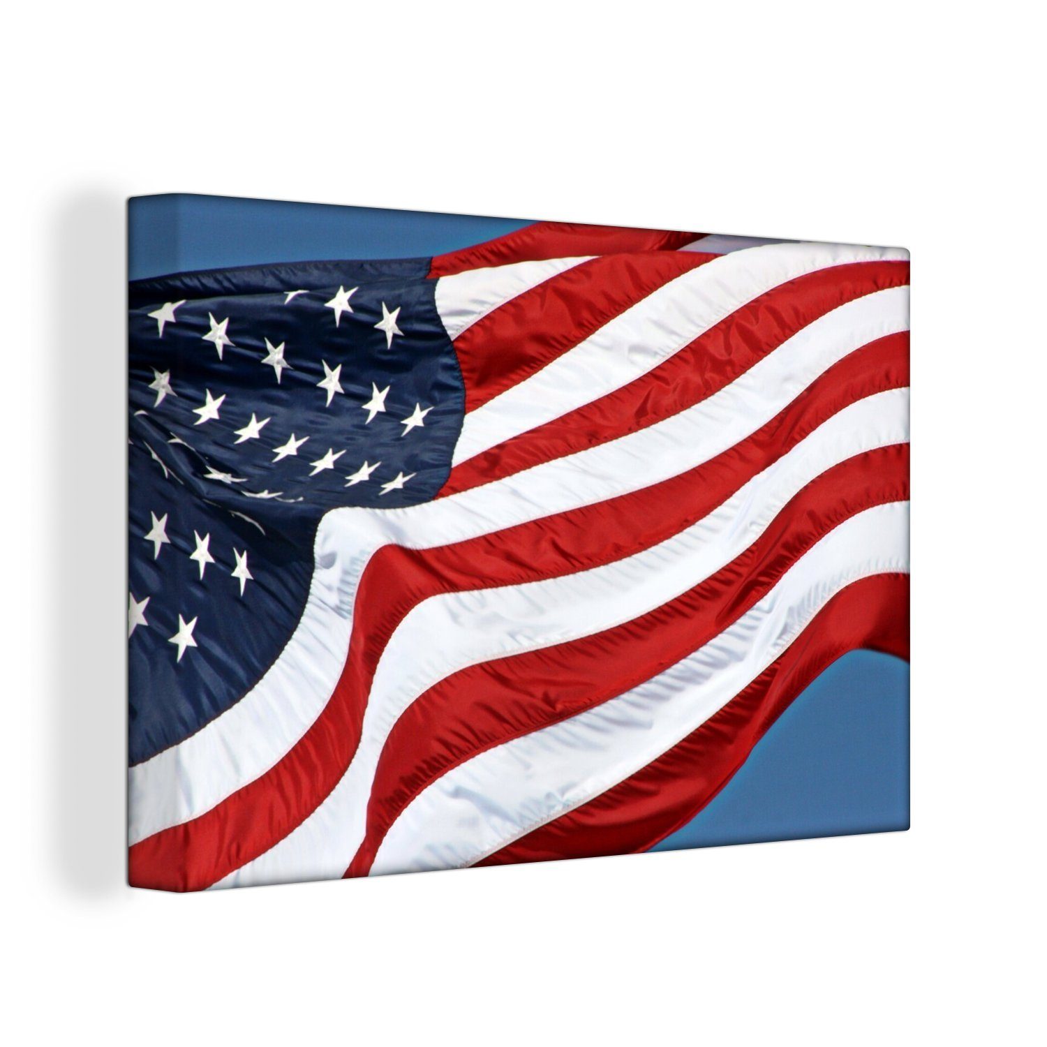 Leinwandbild Wandbild Staaten Wanddeko, Wind, St), Vereinigten im 30x20 Flagge cm OneMillionCanvasses® der Die (1 Aufhängefertig, Leinwandbilder,