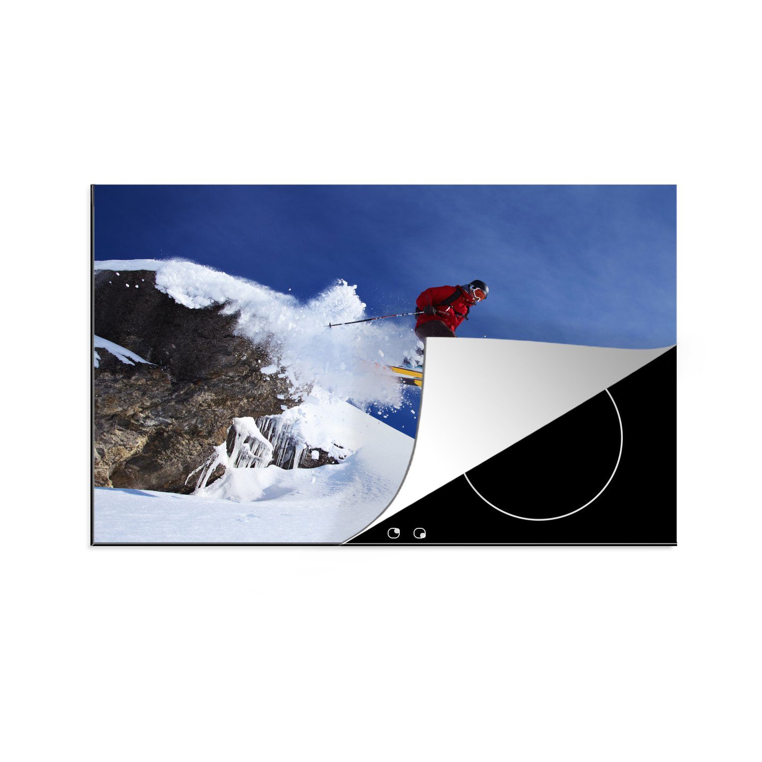 MuchoWow Herdblende-/Abdeckplatte Ein Skifahrer macht einen Sprung von einem schneebedeckten Felsen, Vinyl, (1 tlg), 81x52 cm, Induktionskochfeld Schutz für die küche, Ceranfeldabdeckung