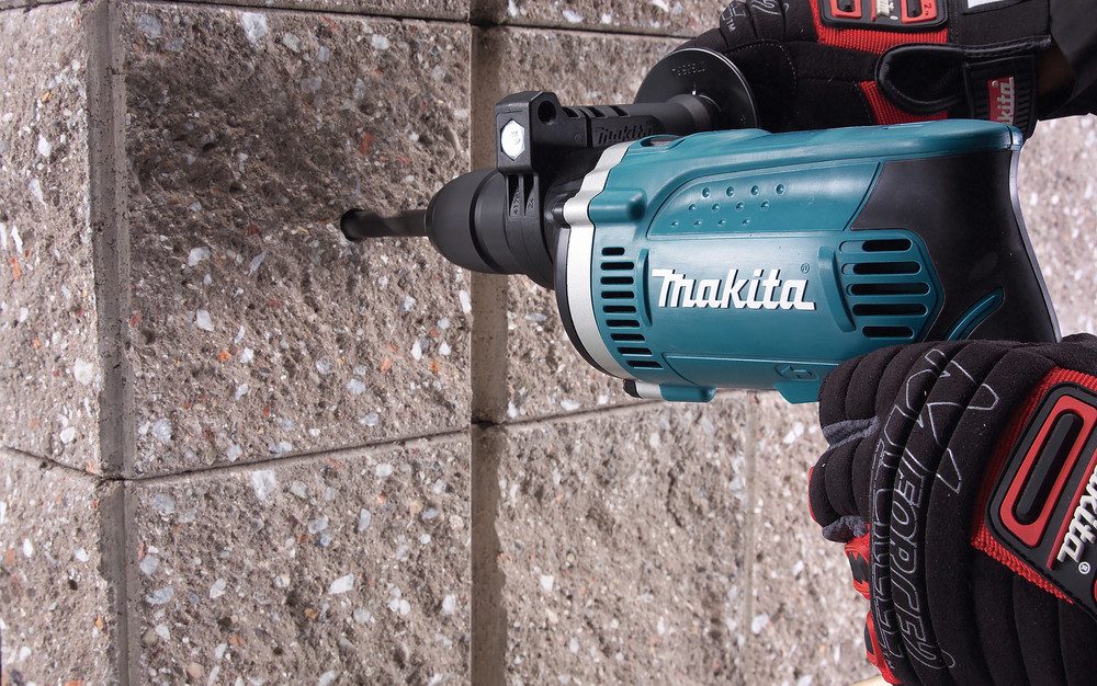 Makita Schlagbohrmaschine HP1631KX3, 220-240 V, max. 3200 U/min, inkl. 74-tlg. Zubehörset und Aufbewahrungskoffer