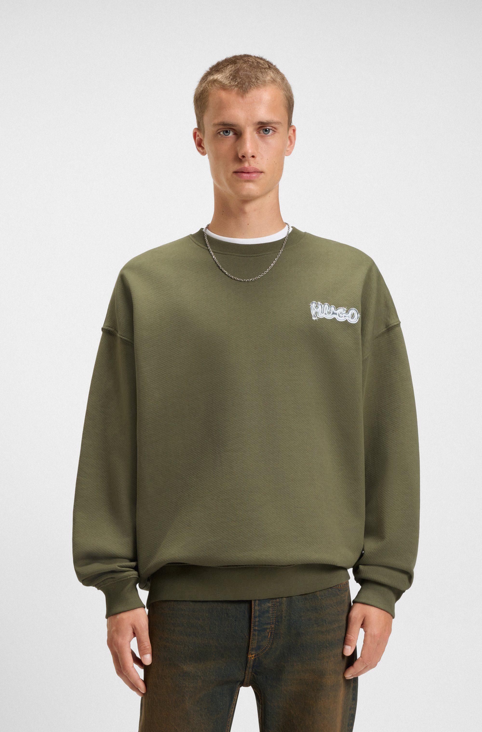 HUGO Blue Sweatshirt Nyrocrew Rückenaufdruck in Chrom-Optik, Rundhalsausschnitt, Loose fit