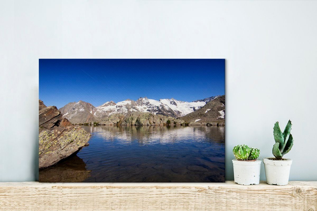 Himmel Gran-Paradiso-Nationalpark Wanddeko, cm dem OneMillionCanvasses® Leinwandbilder, Italien, 30x20 Wandbild St), Blauer über in (1 Leinwandbild Aufhängefertig,