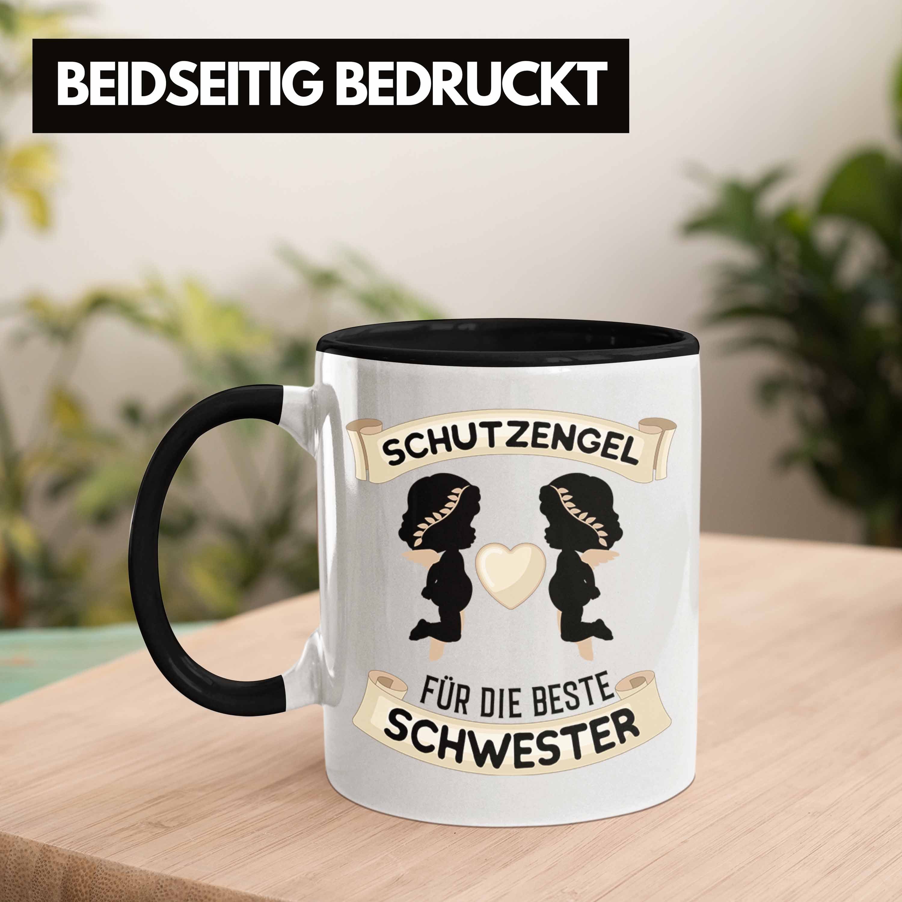 Trendation Tasse Trendation - Schutzengel Beste Schwester Schwester Tasse Geburtstag Schwarz für Geschenk Geschenkidee Schwester